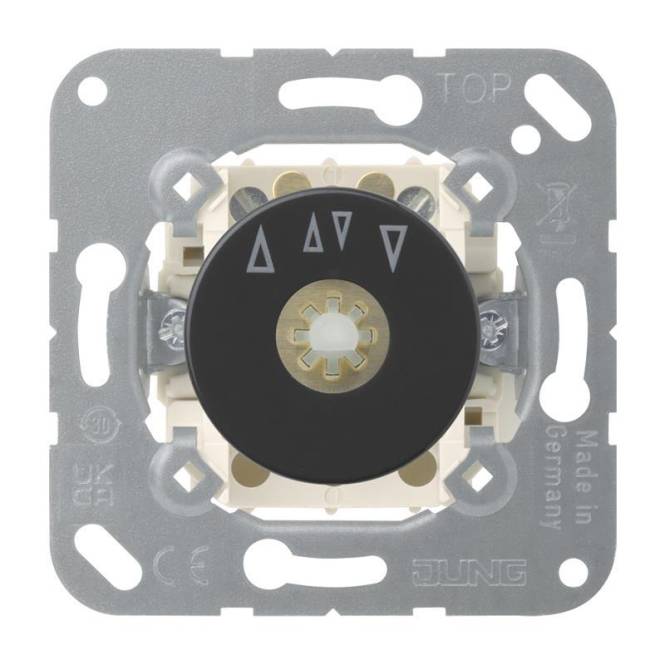 Ein rotierender elektrischer Dimmerschalter mit dreieckigen Symbolen, die Lichtstärkeebenen anzeigen, montiert auf einer Metallplatte.