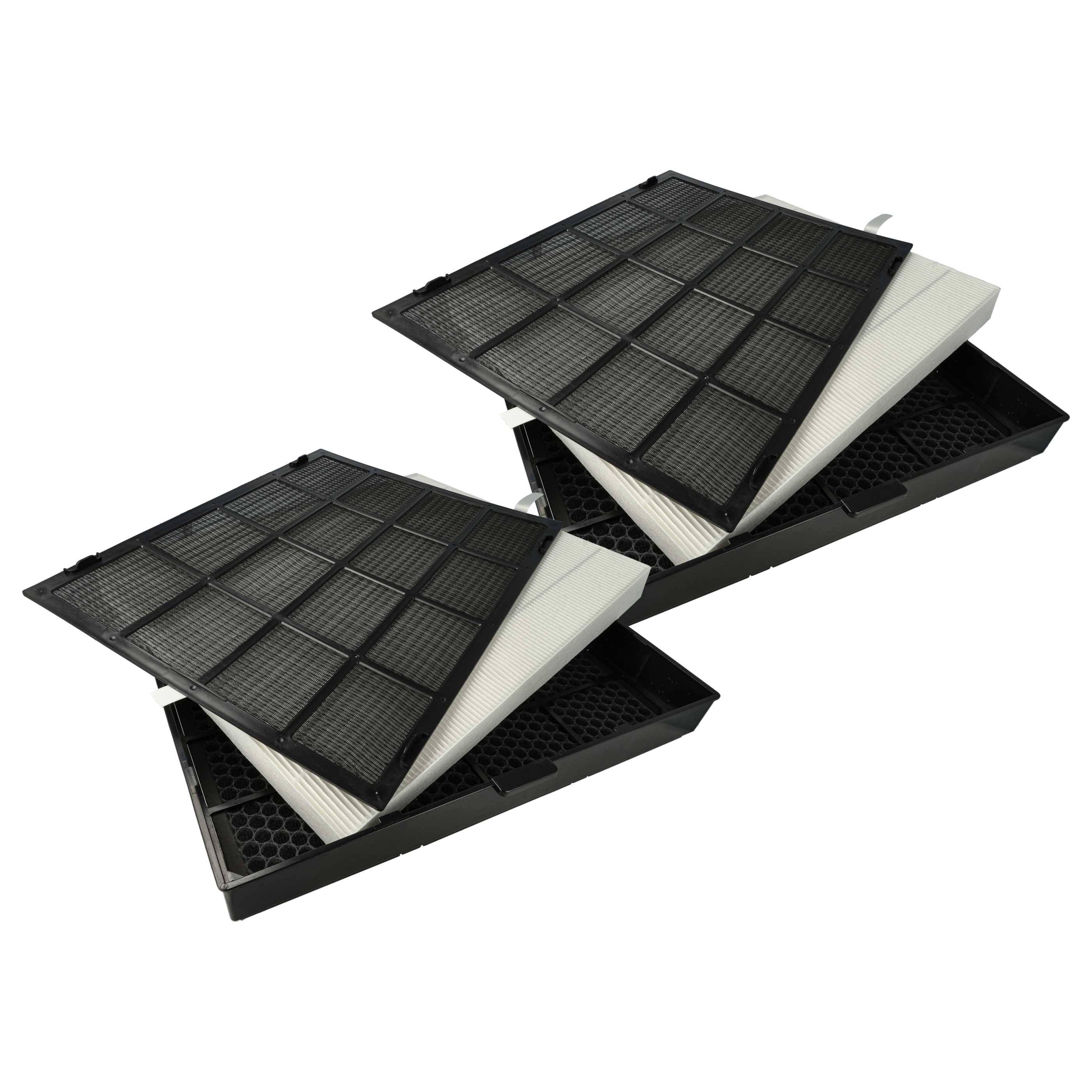 Zwei offene schwarze quadratische Luftreinigungsfilter, von denen jeder mehrere weiße Schichten im Inneren zeigt, vor einem schlichten weißen Hintergrund dargestellt.