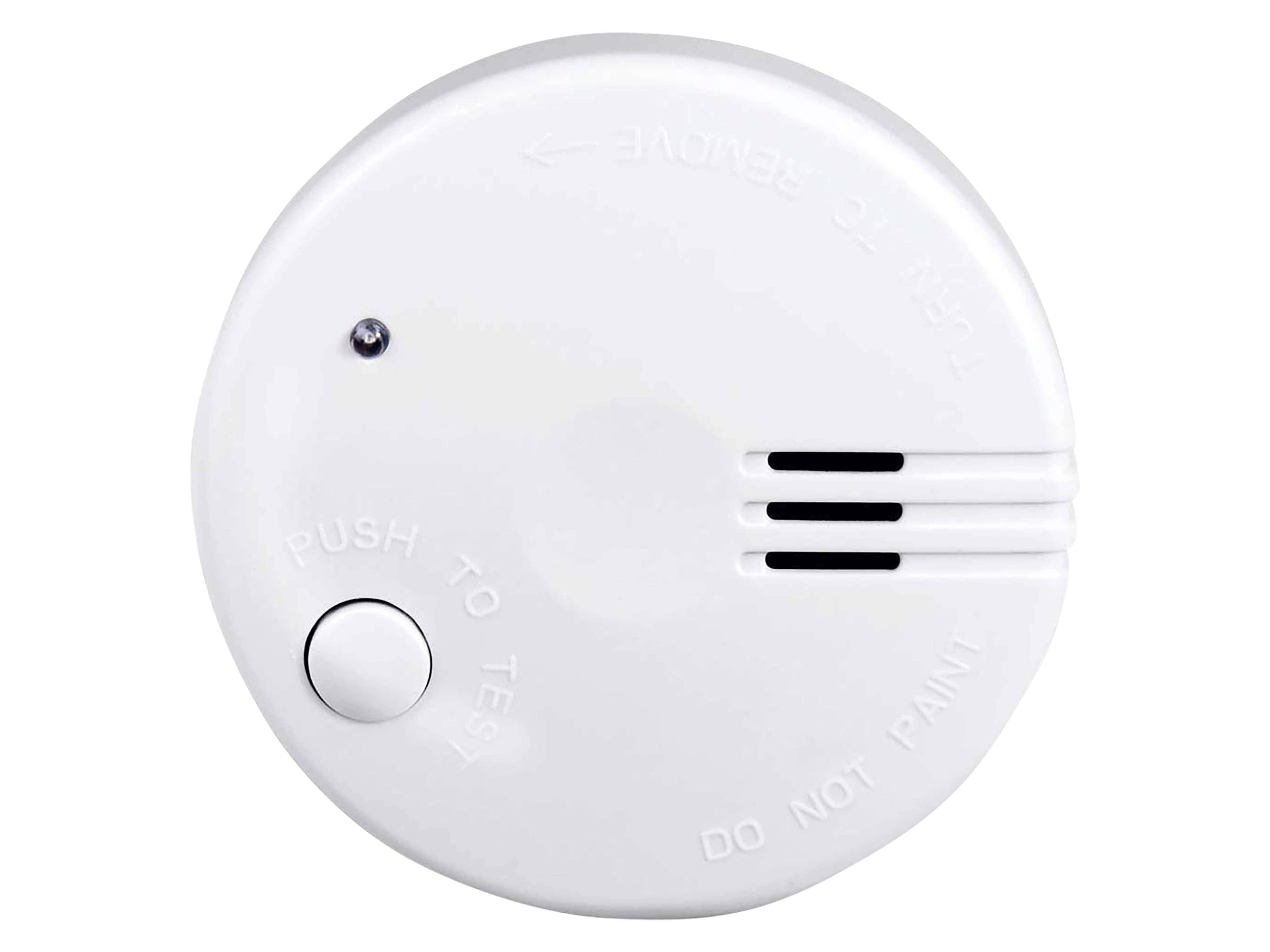 Ein runder, weißer Rauchmelder mit der Aufschrift „PUSH TO TEST