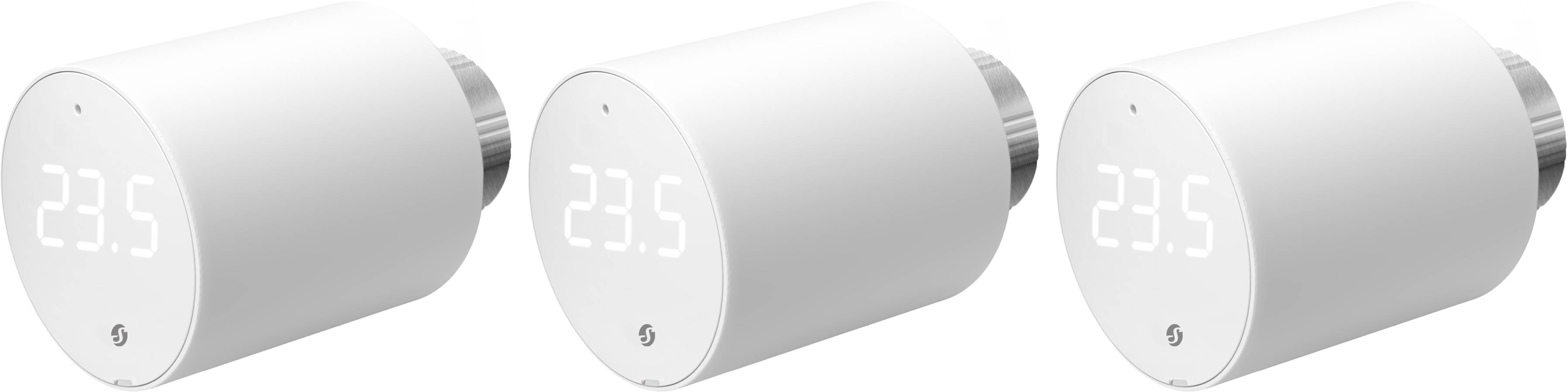 Weiße zylindrische digitale Uhr mit LED-Ziffern zeigt '23.5' an; minimalistisches Design mit kleinem Logo unten.