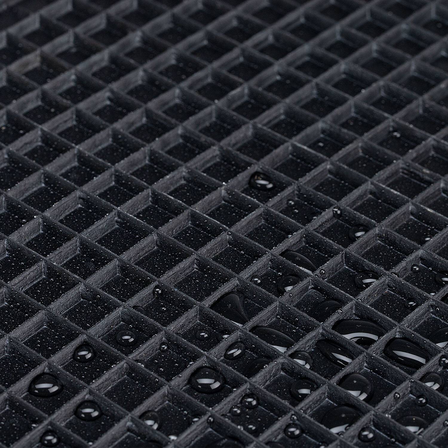 Schwarze Gummi-Griffauflage mit Abmessungen: Draufsicht zeigt Durchmesser von 125mm, innerer Kreis 90mm, erhöhter Bereich 30mm; Seitenansicht zeigt Höhe von 26mm, Schlitztiefe von 10mm.