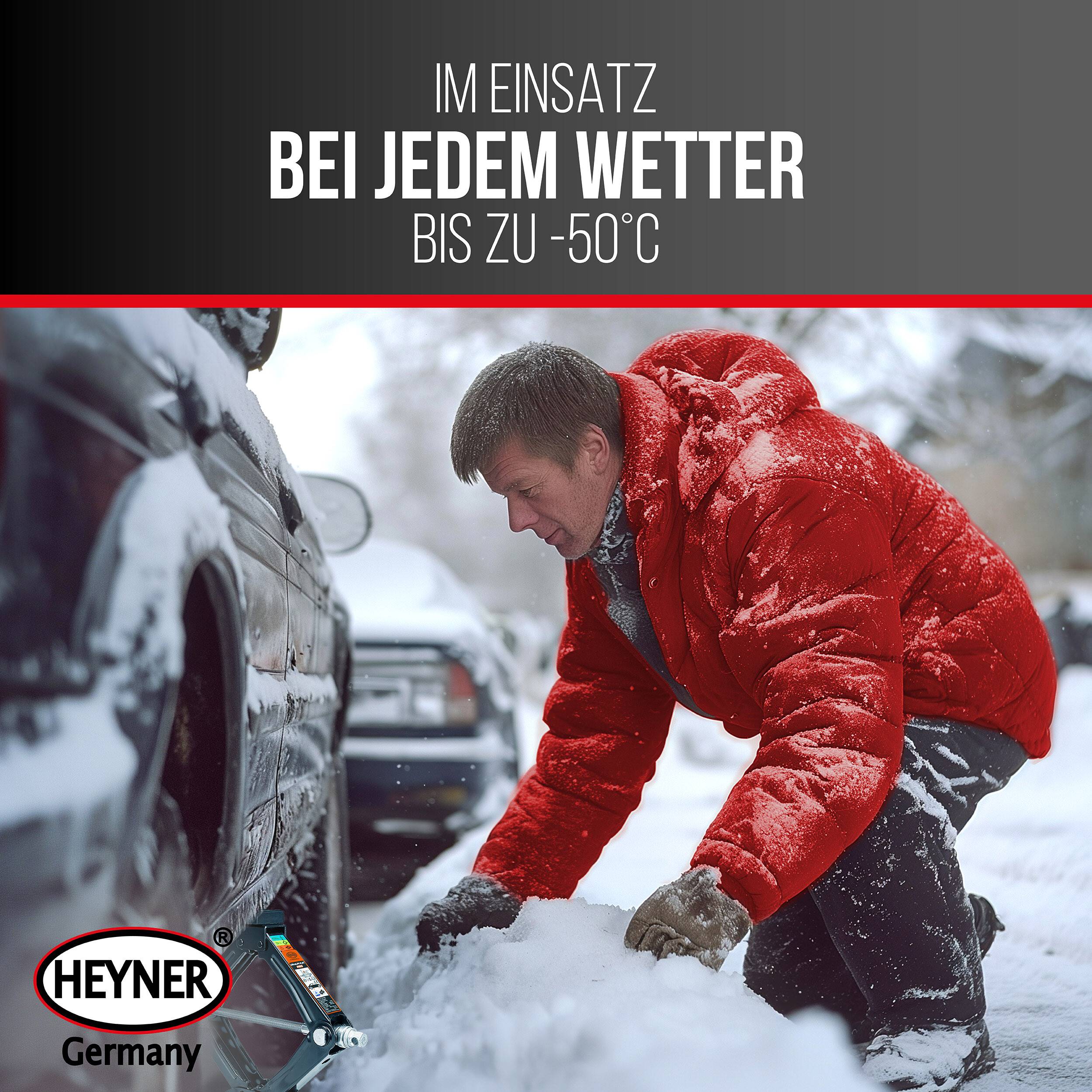 Mann in roter Jacke räumt tiefem Schnee neben einem Auto in einer Winterszene; der Anzeigentext sagt „IM EINSATZ BEI JEDEM WETTER BIS ZU -50°C
