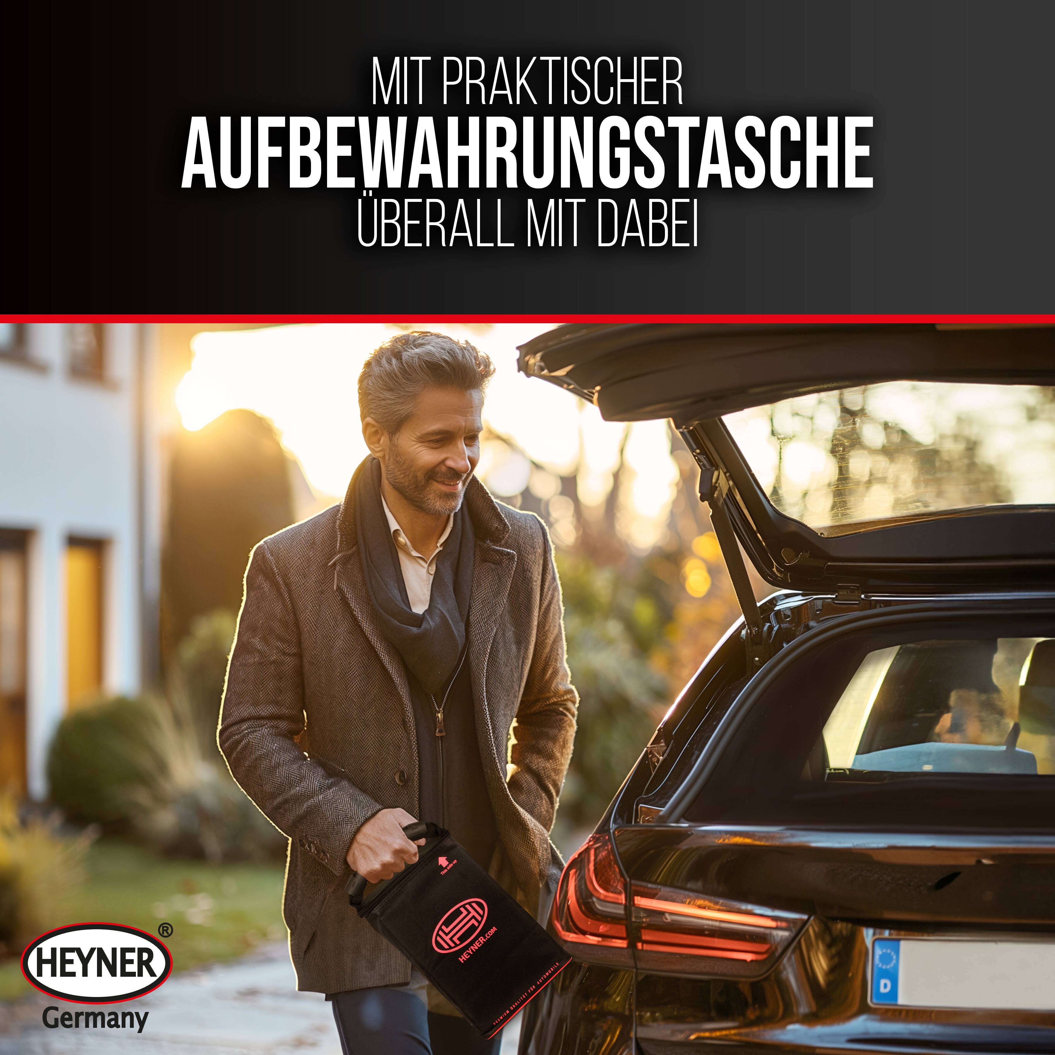 Mann, der eine schwarze Heyner Germany Aufbewahrungstasche neben einem offenen Kofferraum hält; deutscher Text sagt „Mit praktischer Aufbewahrungstasche, überall mit dabei.