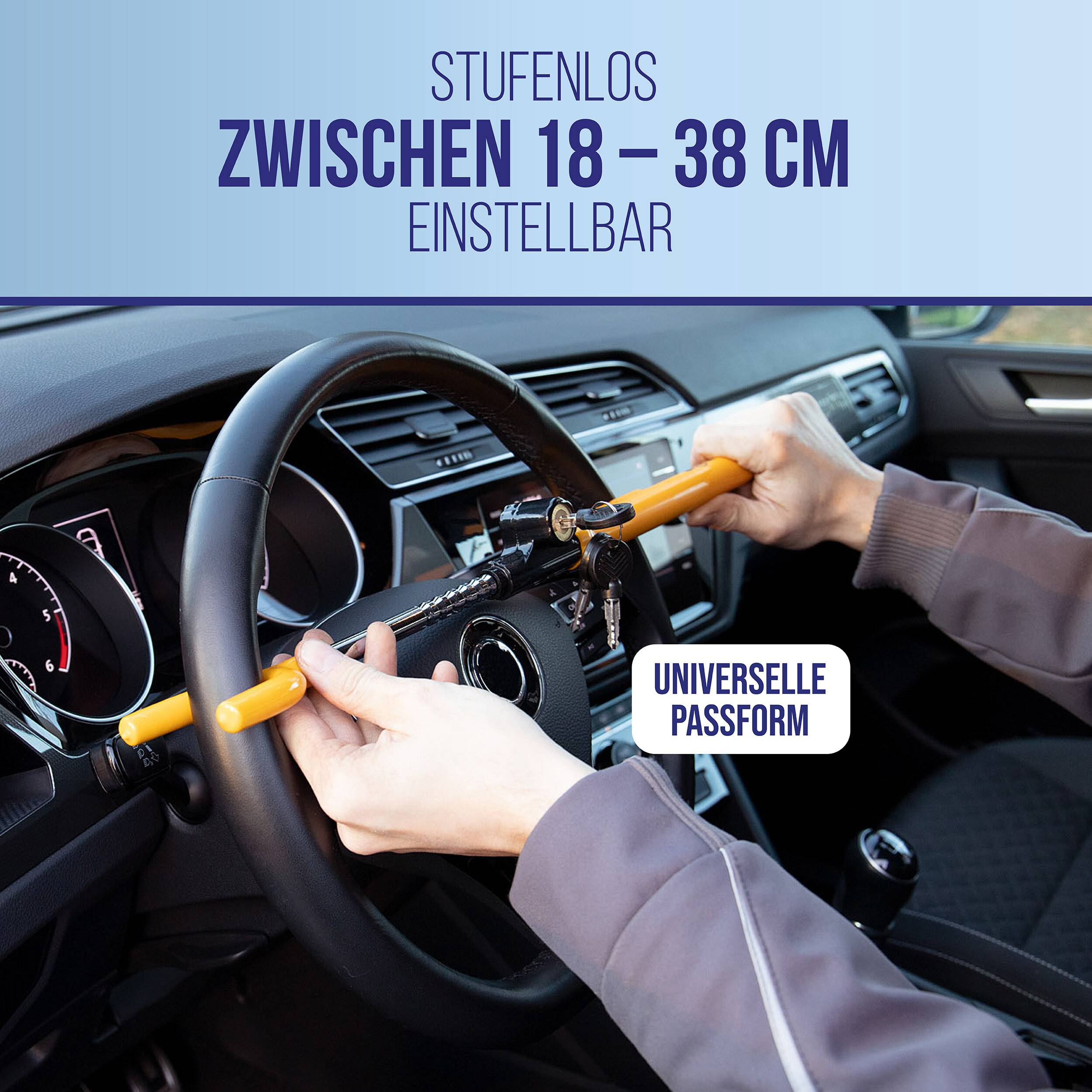 Hände installieren eine universelle Lenkradsperre in einem Auto; der Text besagt verstellbar von 18 bis 38 cm und universelle Passform.