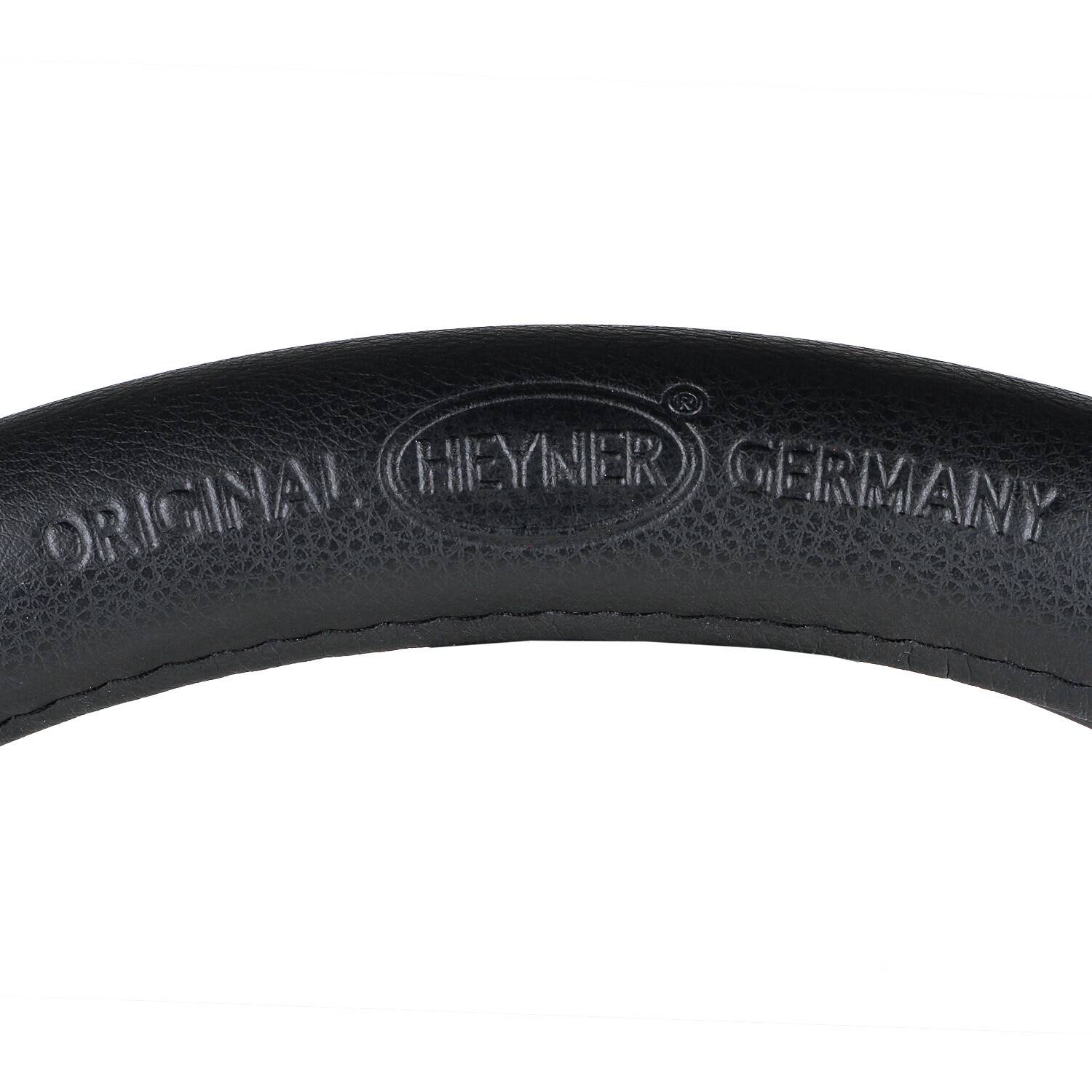 Eine schwarze strukturierte Oberfläche mit geprägtem Text: „Original Heyner Germany.