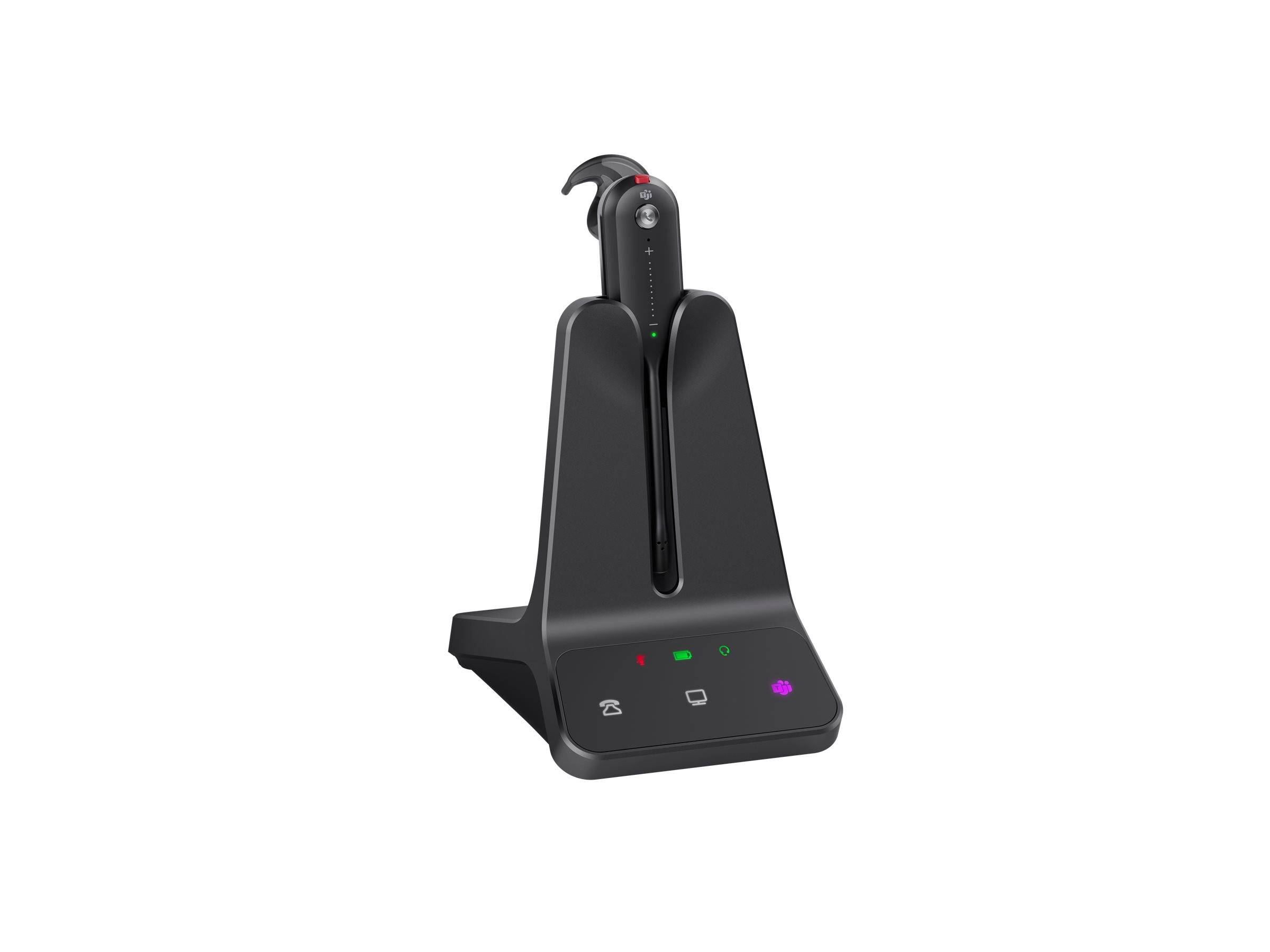 Ein schwarzes kabelloses Headset, das auf seinem Ladegerät ruht, mit Statusanzeigen an der Basis, die Energie- und Konnektivitätssignale zeigen.