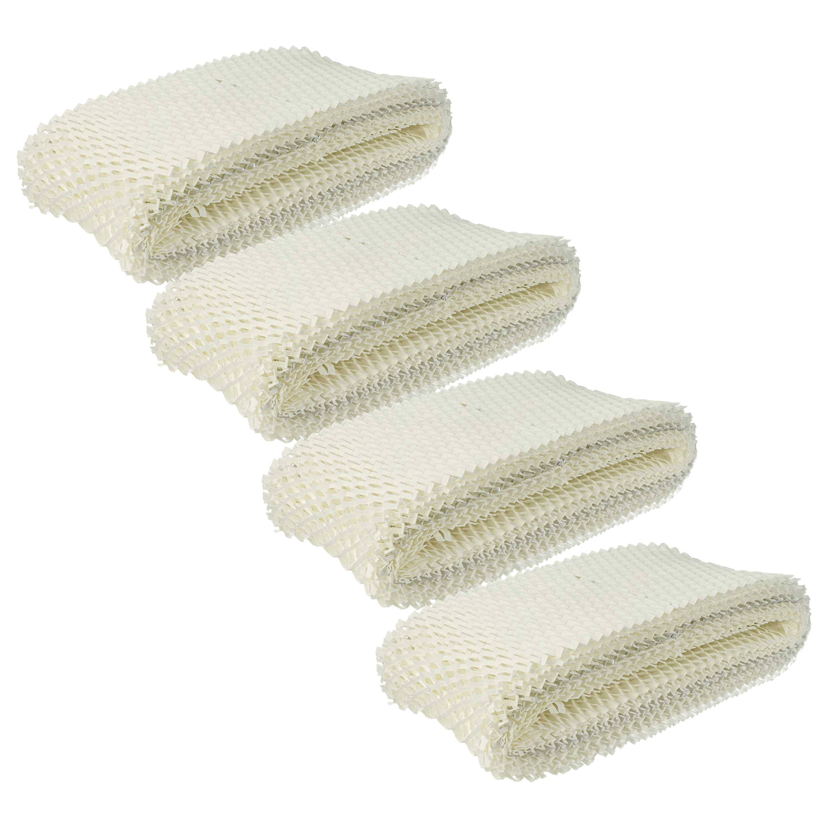Vier gestapelte, gefaltete Tücher in Creme mit strukturiertem Waffelmuster. Sie wirken ordentlich und gleichmäßig und deuten auf einen Satz ähnlicher Gegenstände hin.