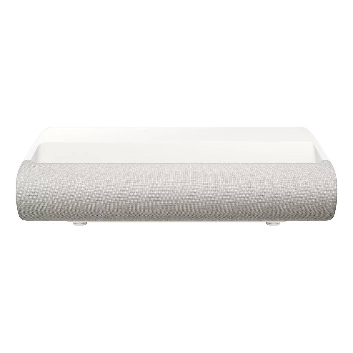 Ein weißer und grauer rechteckiger kabelloser Lautsprecher mit Stofffront und minimalistischem Design, ideal für moderne Heimaudioanlagen.