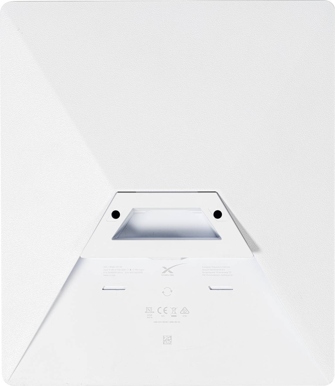 Ein minimalistisches, wandmontiertes Objekt mit subtiler geometrischer Gestaltung in Weiß. Es verfügt über kleine runde Löcher und geprägte Symbole.