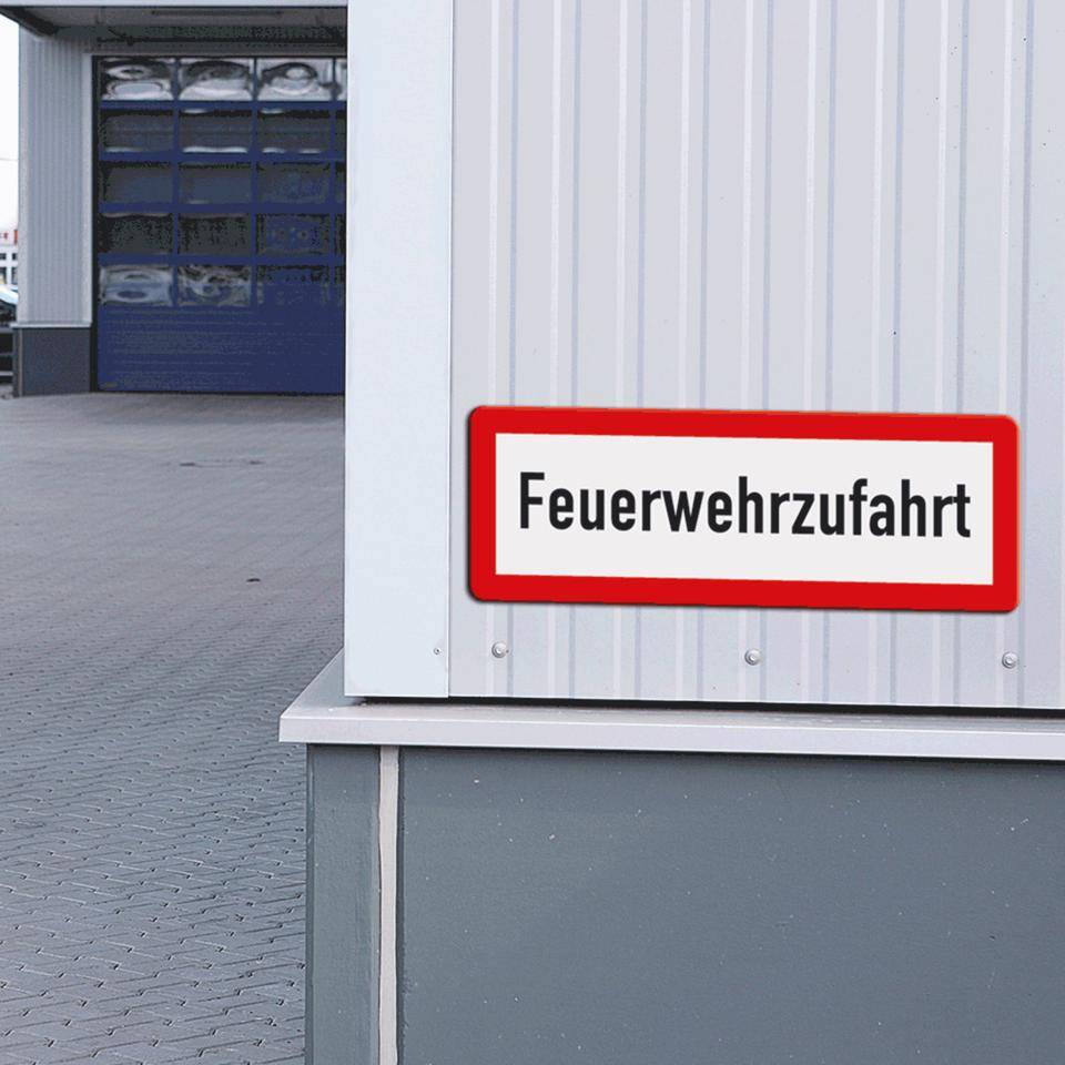 Hinweisschild Feuerwehrzufahrt, Aluminium RA0, reflektierend, 594x210mm, DIN 67520