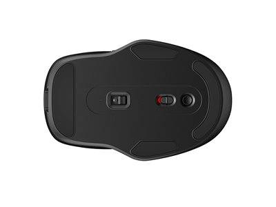 Das Bild zeigt die Unterseite einer schwarzen Computermaus mit einem zentralen Sensor, einem Links-Rechts-Schiebeschalter und einem Stromschalter.