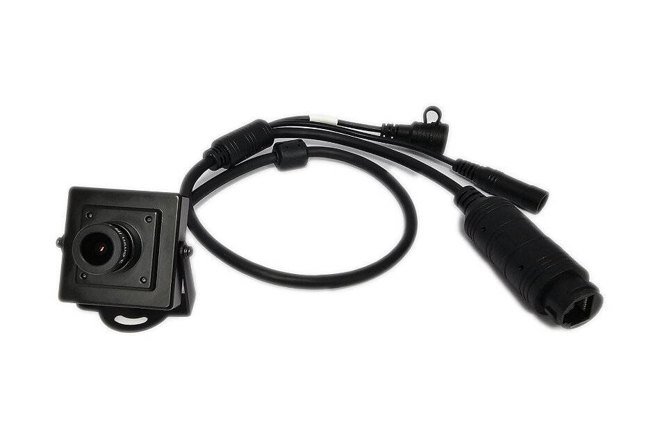 Schwarzes Kabelanschlussmodul mit Linse und wasserdichtem Stecker, dargestellt auf weißem Hintergrund.