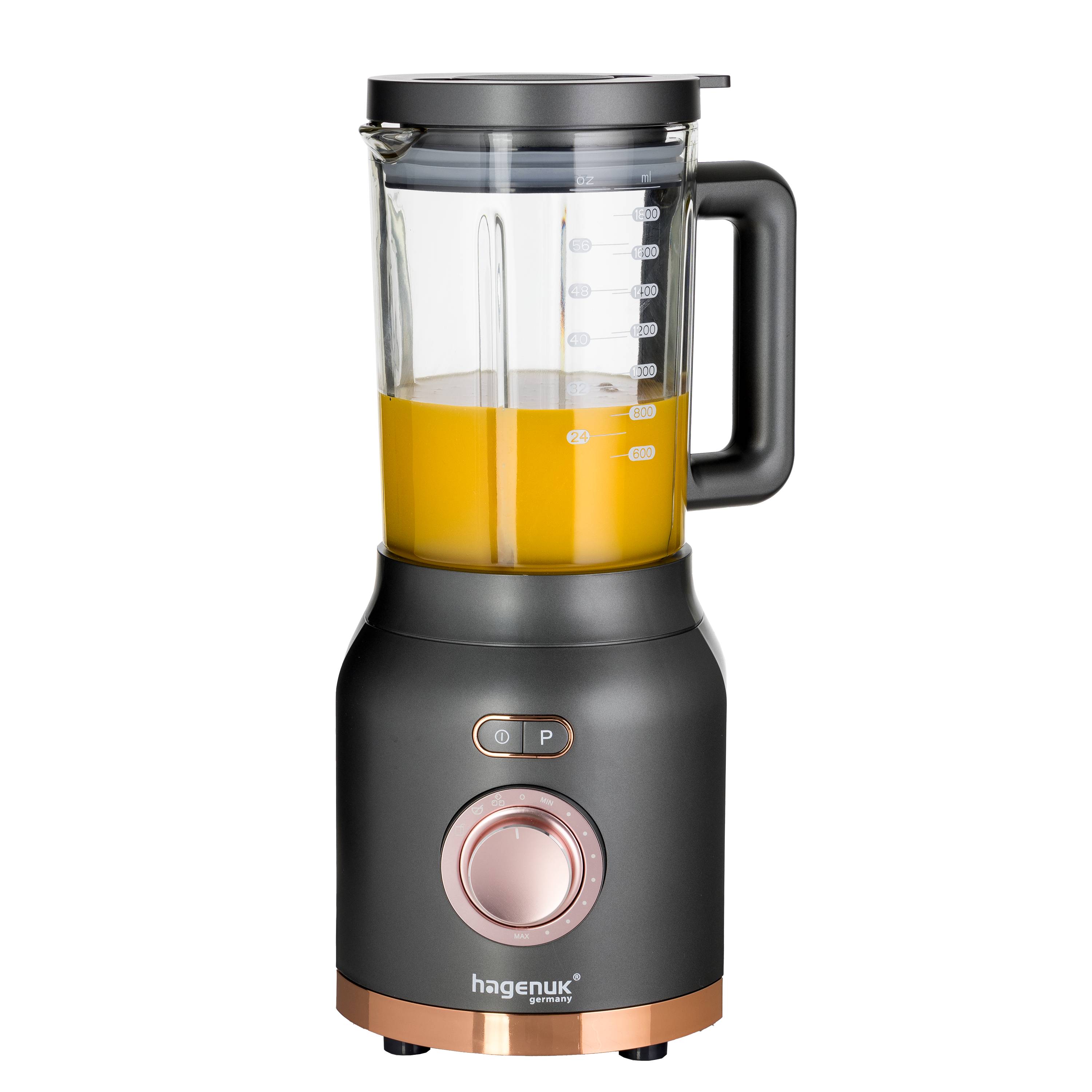 Ein schwarz-kupferner Mixer mit einem Glasbehälter gefüllt mit orangefarbiger Flüssigkeit, mit einem Ein-/Ausschalter und einem Drehregler auf schwarzem Hintergrund.