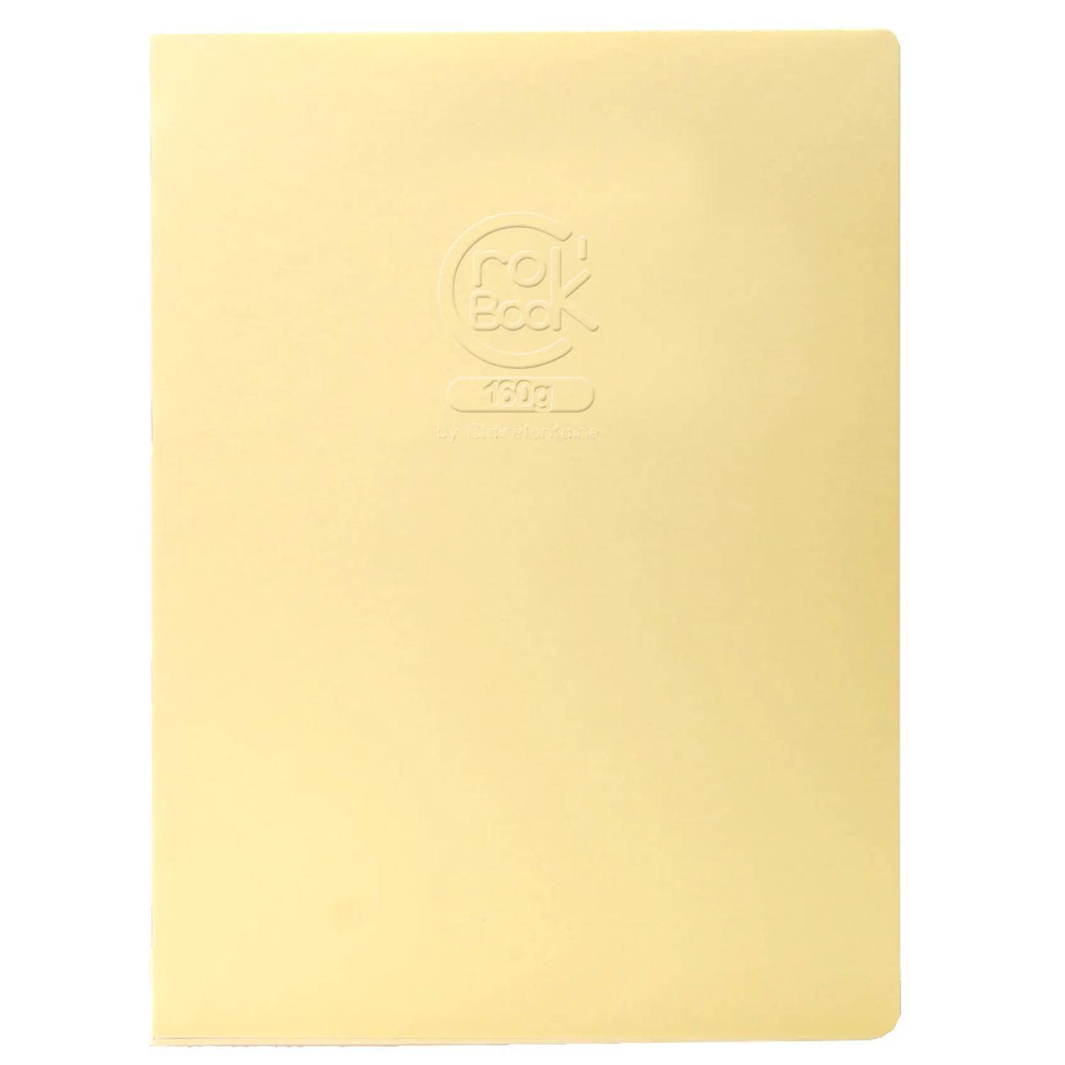 Blasses gelbes Notizbuch oder Ordnerabdeckung mit einem geprägten Kreislogo in der Nähe der oberen Mitte.