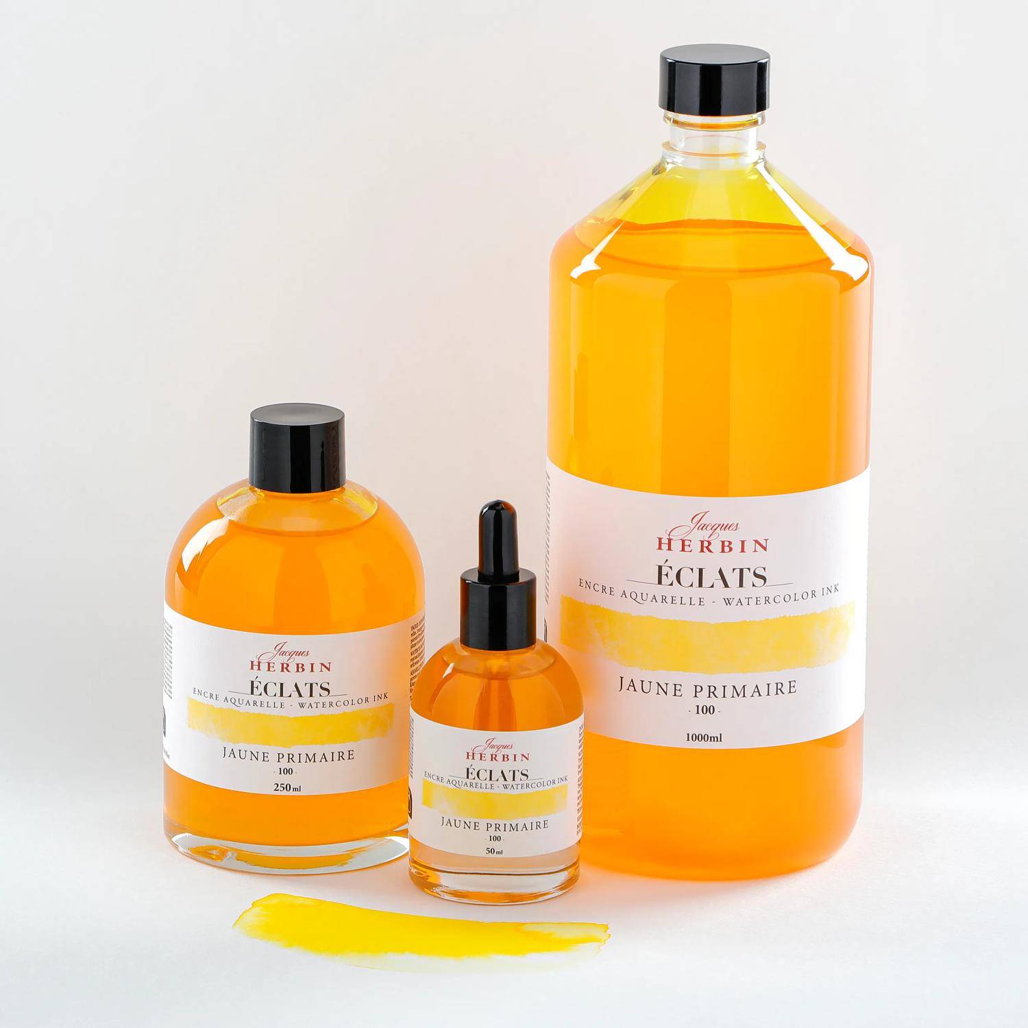 Herbin Éclats' Aquarelltintenfläschchen in verschiedenen Größen, beschriftet mit 'Jaune Primarie'. Die Tinte ist hellgelb, mit einem Farbstreifen-Muster.