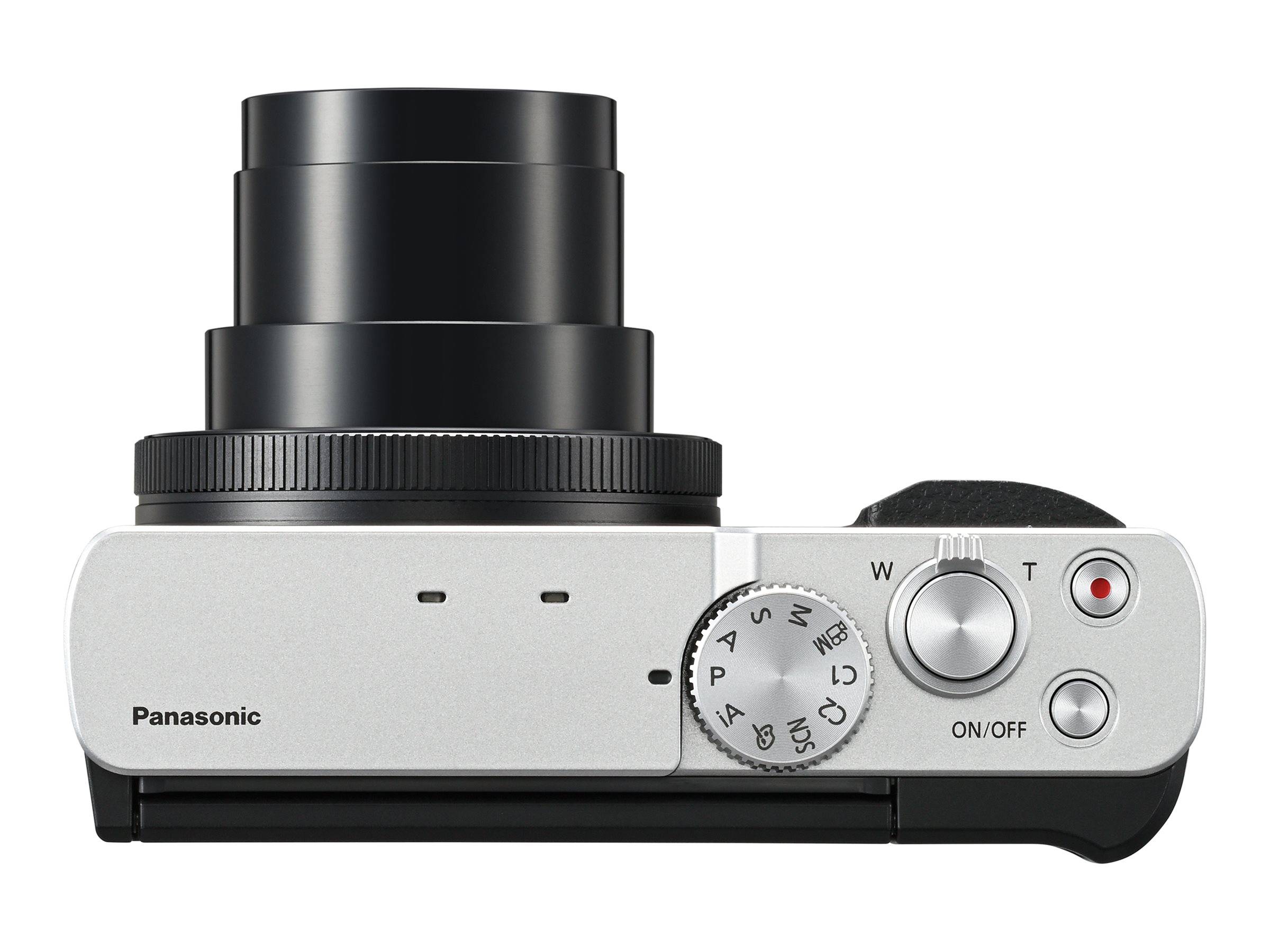 Draufsicht einer kompakten Panasonic-Kamera mit ausgefahrenem Objektiv, Moduswahlscheibe, EIN/AUS-Schalter und Auslöseknopf auf weißem Hintergrund.