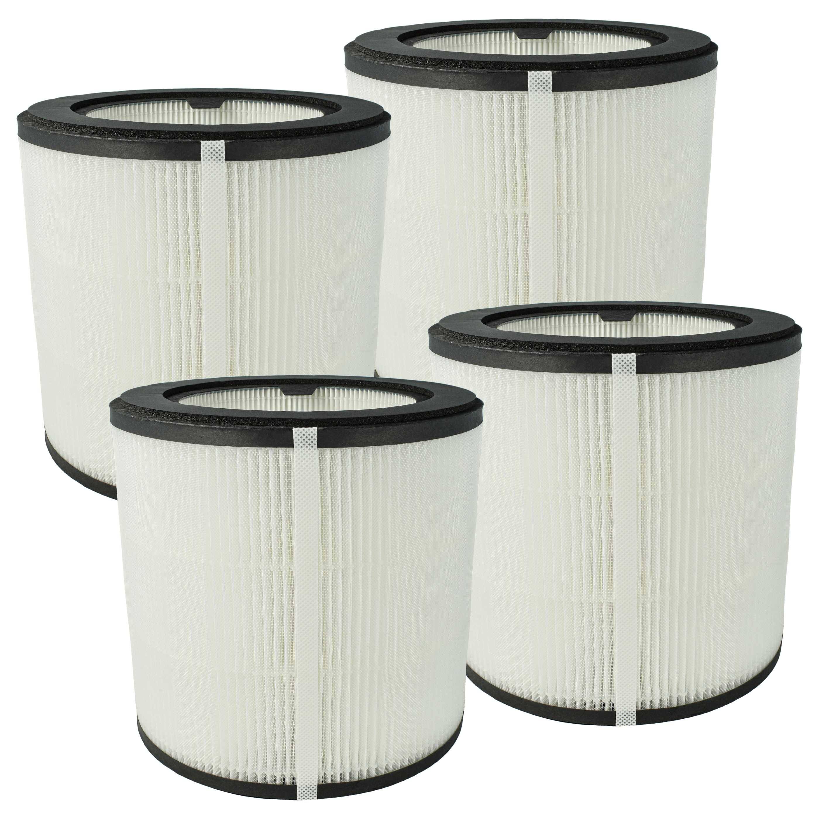 Vier zylindrische Luftfilter aus gefälteltem weißem Stoff mit schwarzen Rändern, in einer Gruppe angeordnet.