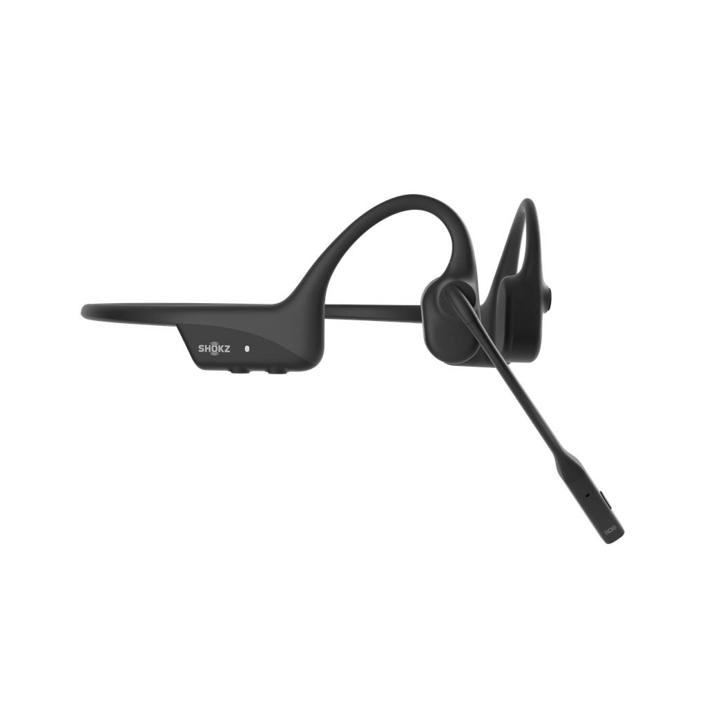 Schwarze Shokz Kopfhörer mit Knochenleitung, Kopfbügel mit Umwicklung und Boom-Mikrofon auf schwarzem Hintergrund.
