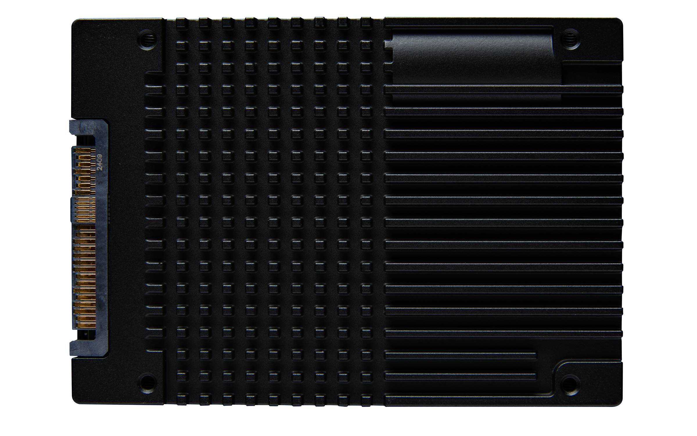 Schwarzes Computer-Hardware-Modul mit einer Kühlrippenoberfläche und einer vergoldeten Steckerleiste, von oben auf dunklem Hintergrund betrachtet.