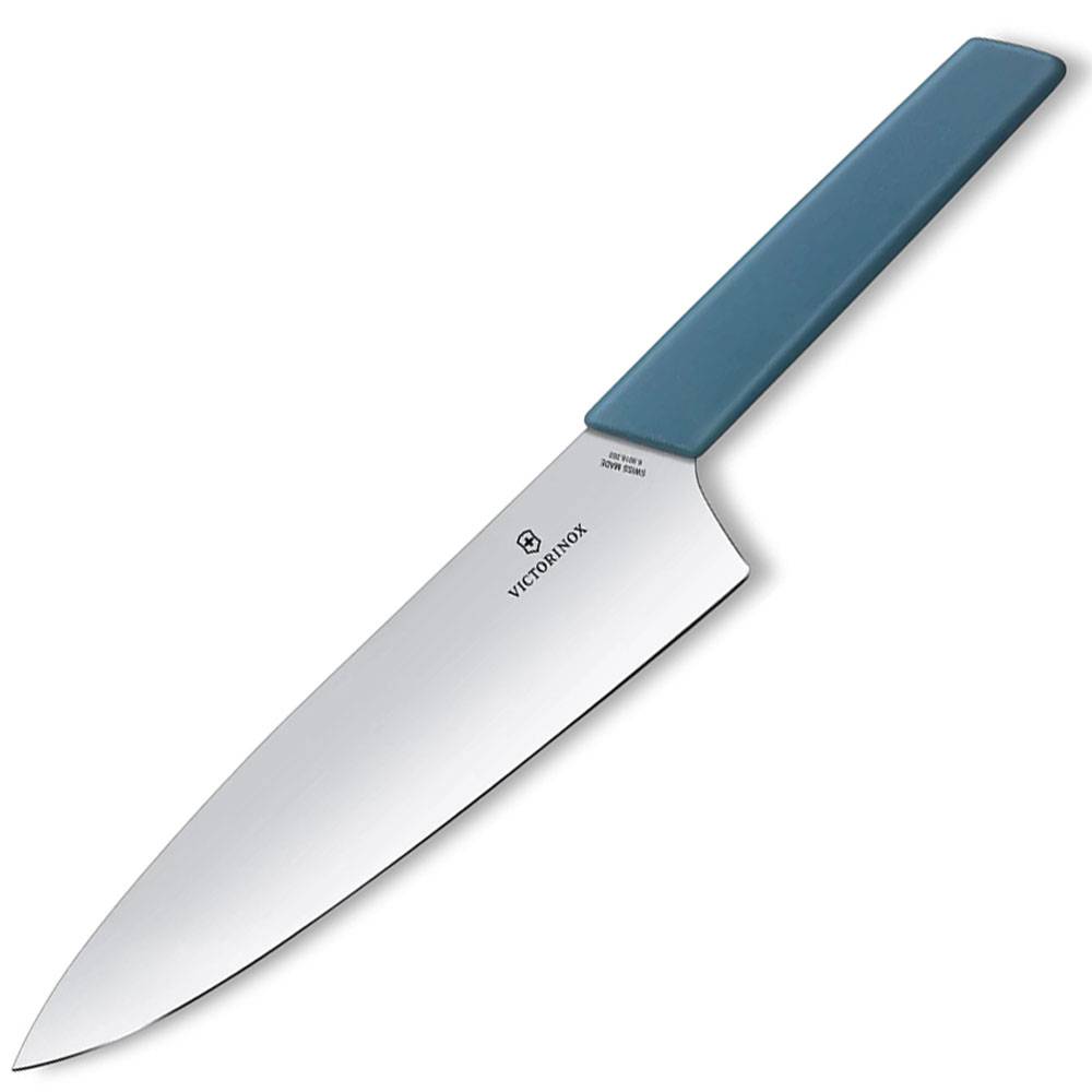 Victorinox Küchenmesser mit türkisfarbenem Griff und silberner Klinge auf weißem Hintergrund dargestellt.