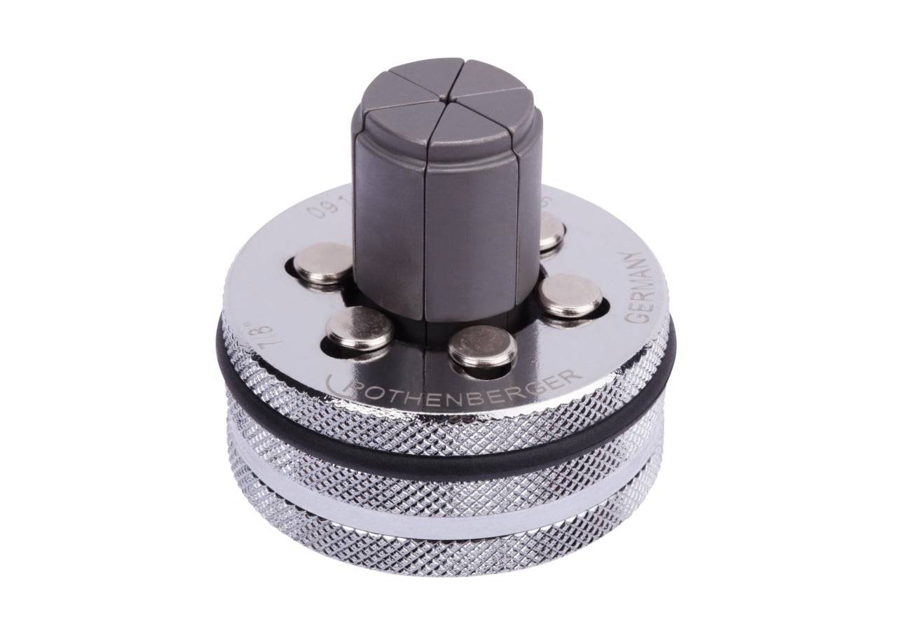 Rothenberger-Rohrabschneider, silber und grau, von oben gezeigt, mit rundem Griff und Metallknopf, zum Schneiden von Rohren verwendet.