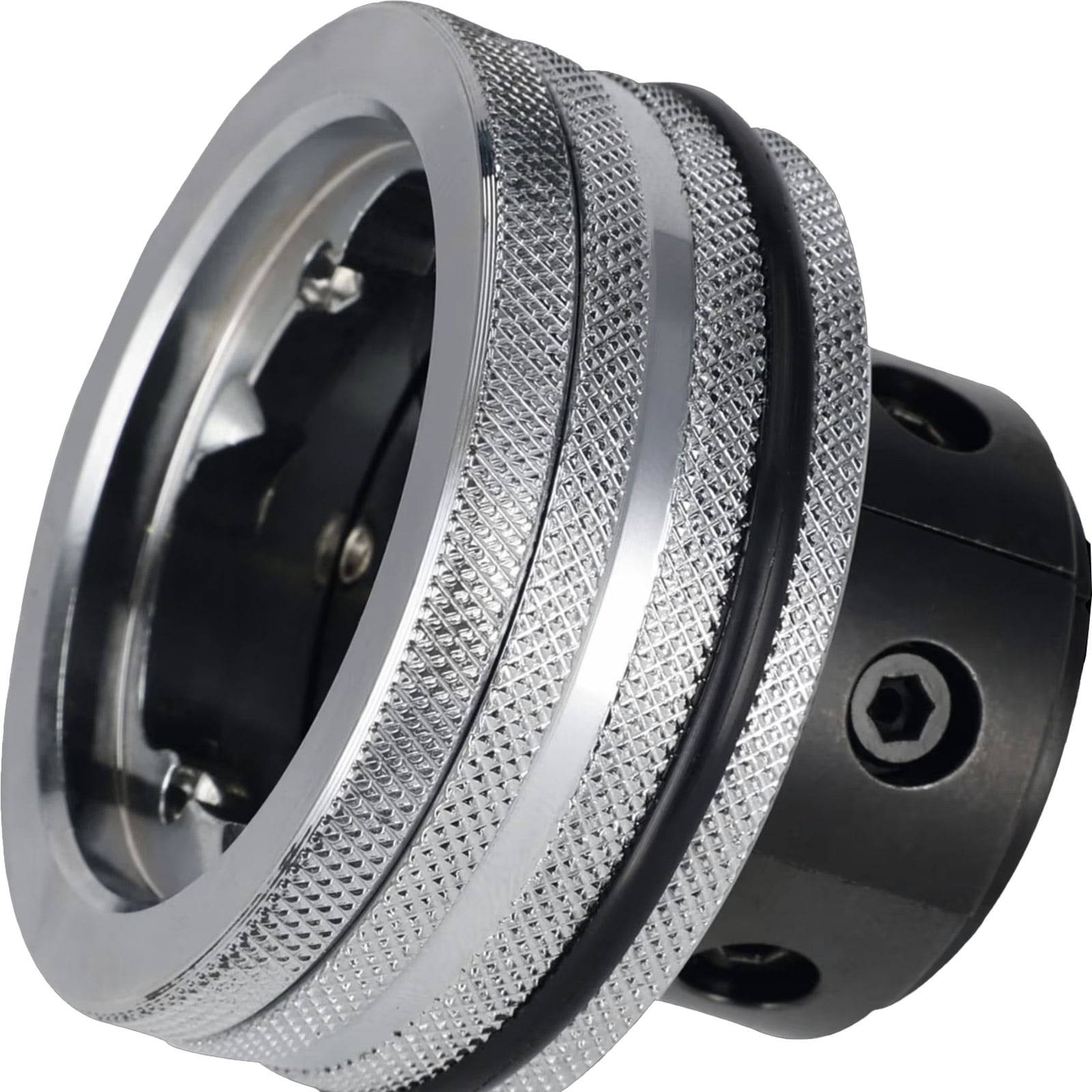 Eine Nahaufnahme eines glänzenden, metallischen Drehknopfs mit strukturierter Oberfläche und zylindrischer Form, der für Präzisionseinstellungen in Maschinen verwendet wird.