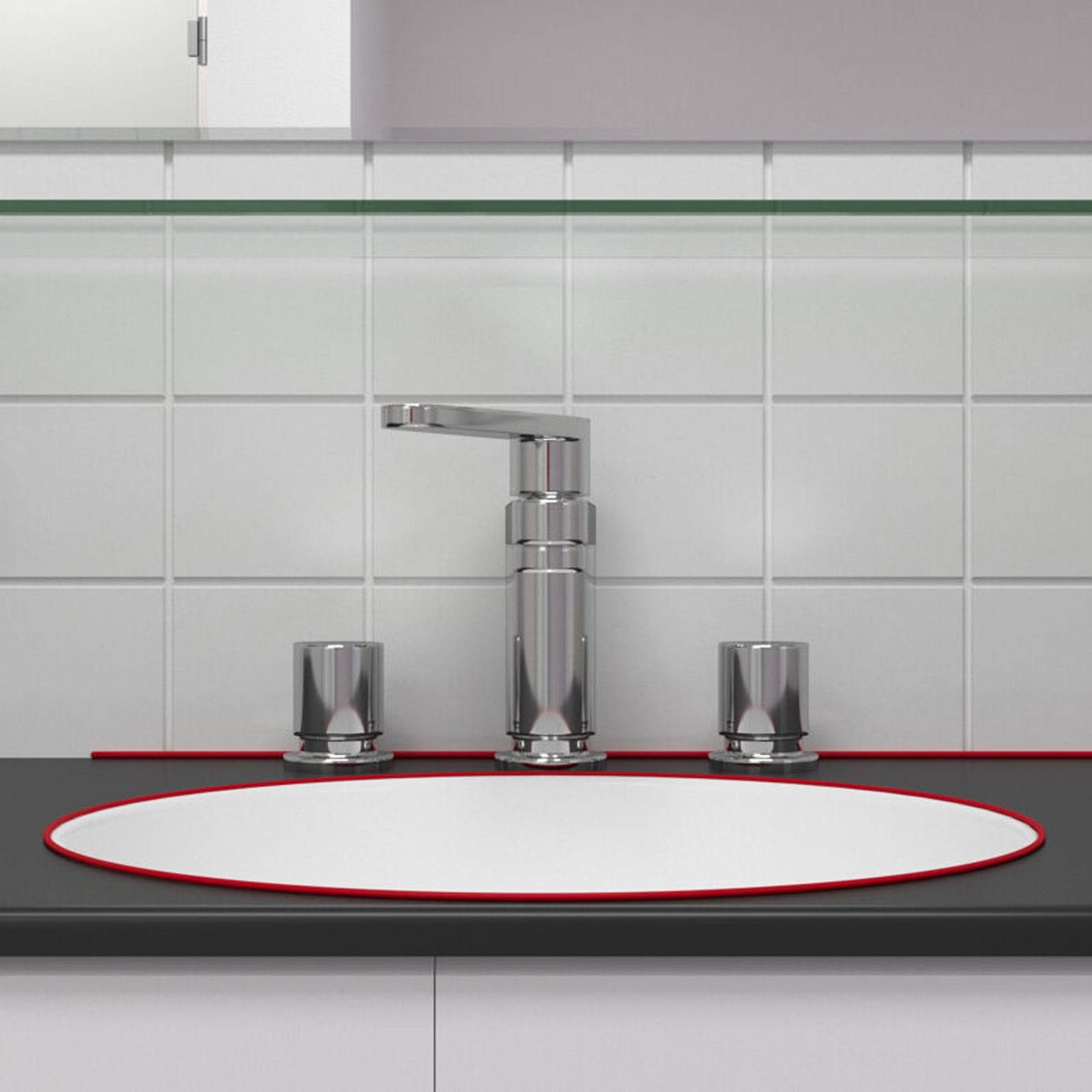 Ein modernes Waschbecken mit einem silbernen Wasserhahn steht vor einer weißen gefliesten Wand. Die Arbeitsplatte ist dunkelgrau, und das Waschbecken ist oval geformt.