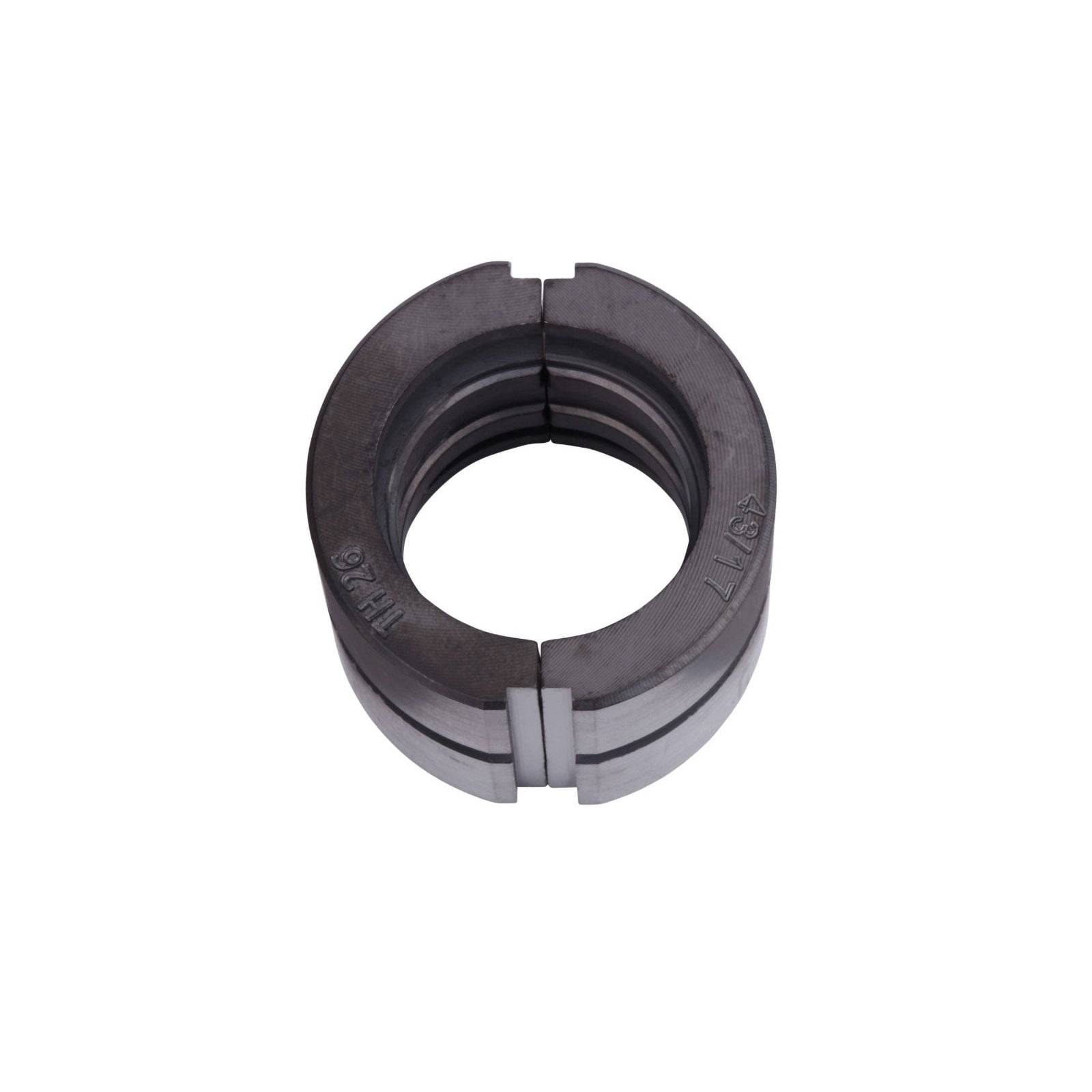 Eine graue Wellenabdeckung mit den Markierungen '52mm' und '1.1/2'.