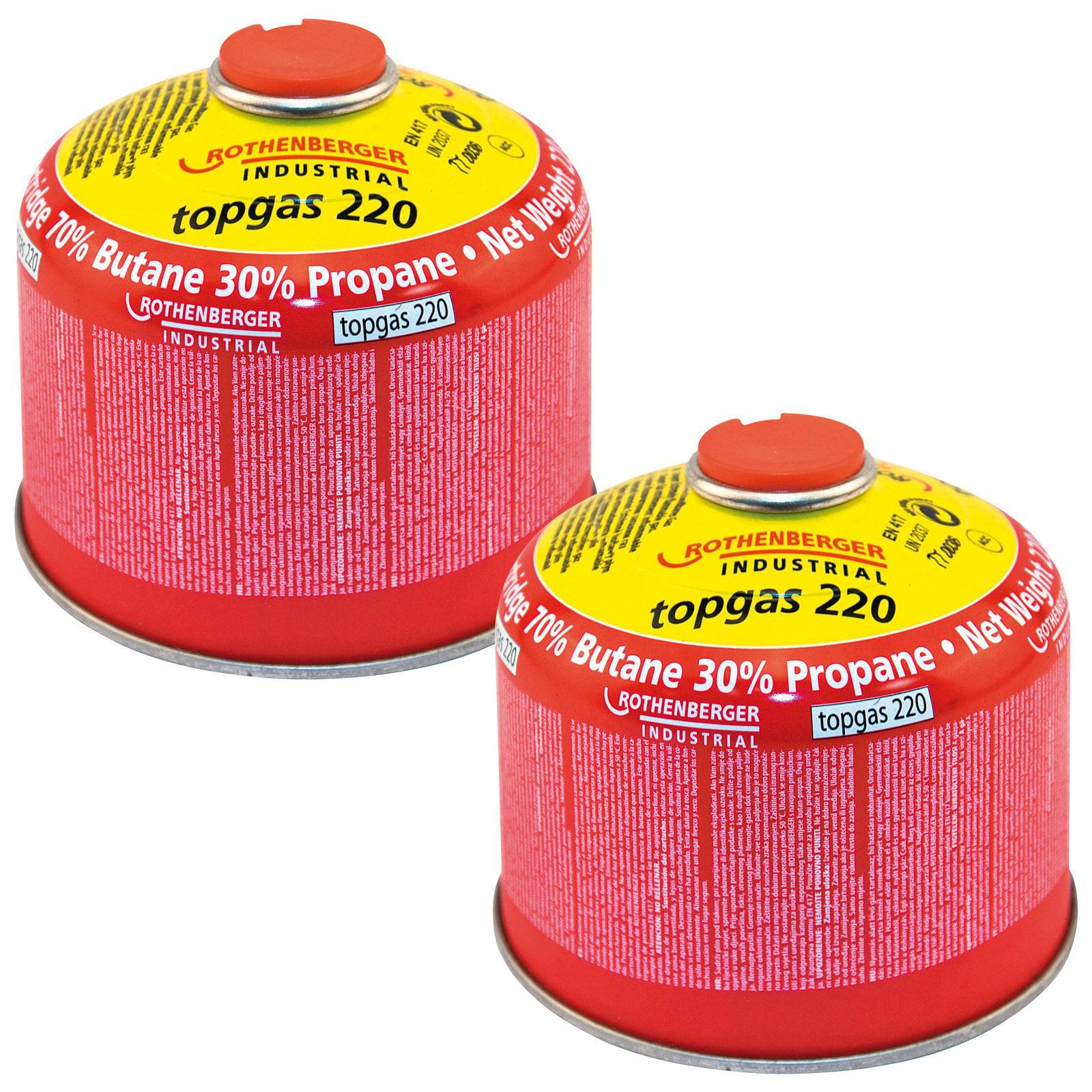 Zwei rote Rothenberger-Gasflaschen, beschriftet mit 'topgas 220', für tragbare Heiz- oder Kochausrüstung.