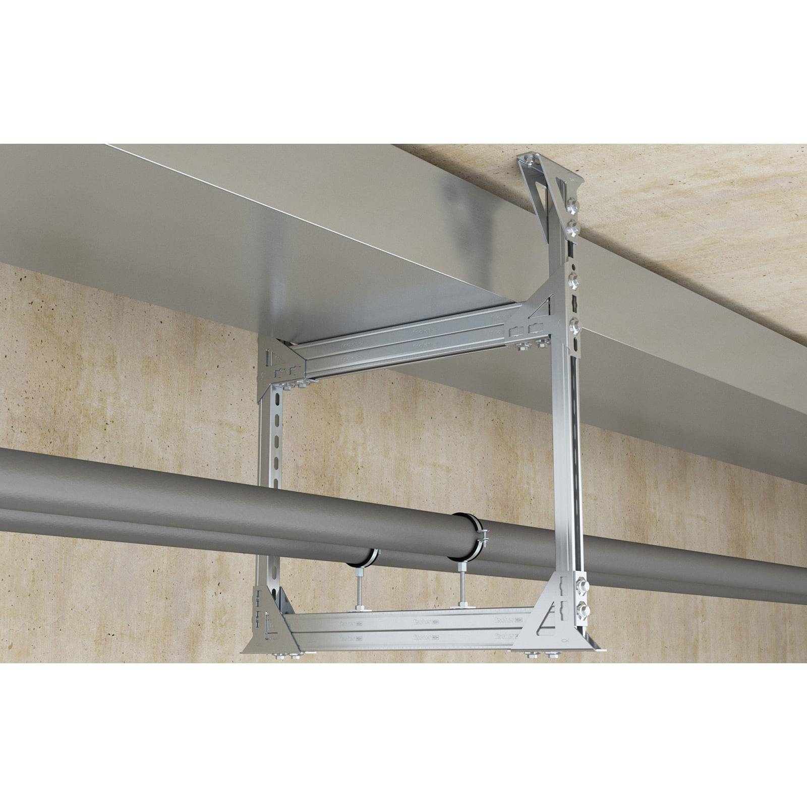Ein Metallrahmen stützt sicher eine große Rohrleitung, die an einer Betondecke befestigt ist und damit eine industrielle Montagelösung veranschaulicht.