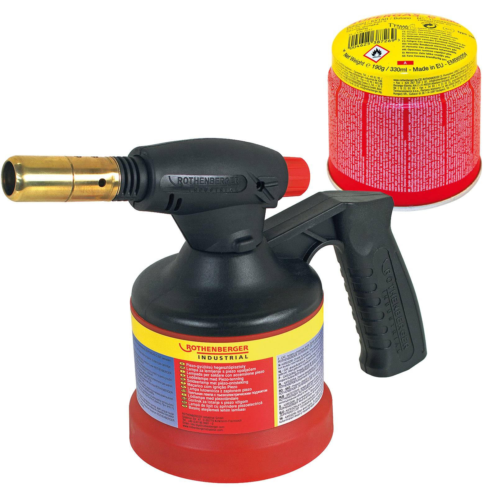 Eine tragbare Gasfackel mit einem schwarzen ergonomischen Griff und roter Basis, begleitet von einer roten und gelben Gaspatrone im Hintergrund.