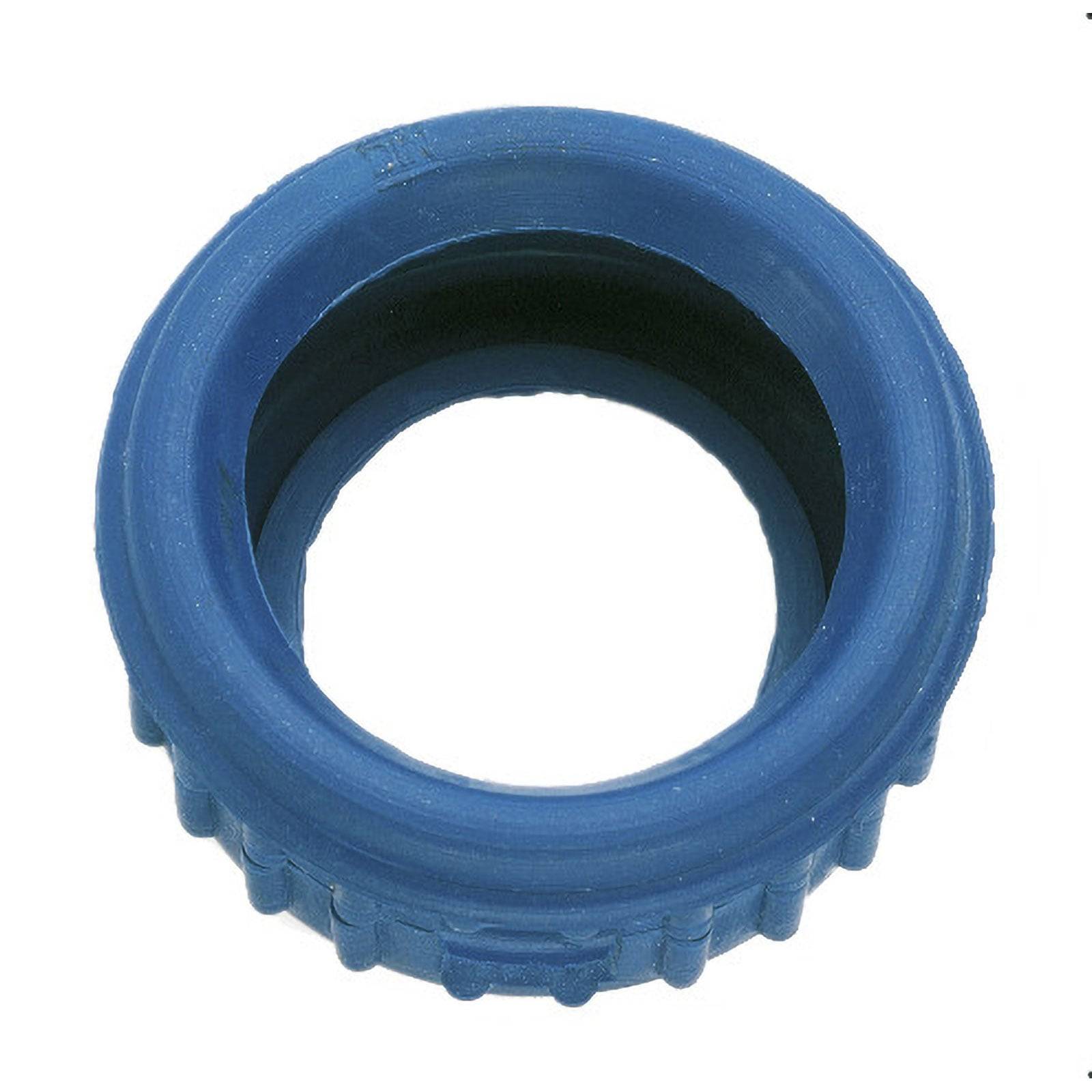 Ein Nahaufnahmebild einer blauen Kunststoffflaschenkappe mit gerillten Kanten, von oben betrachtet.