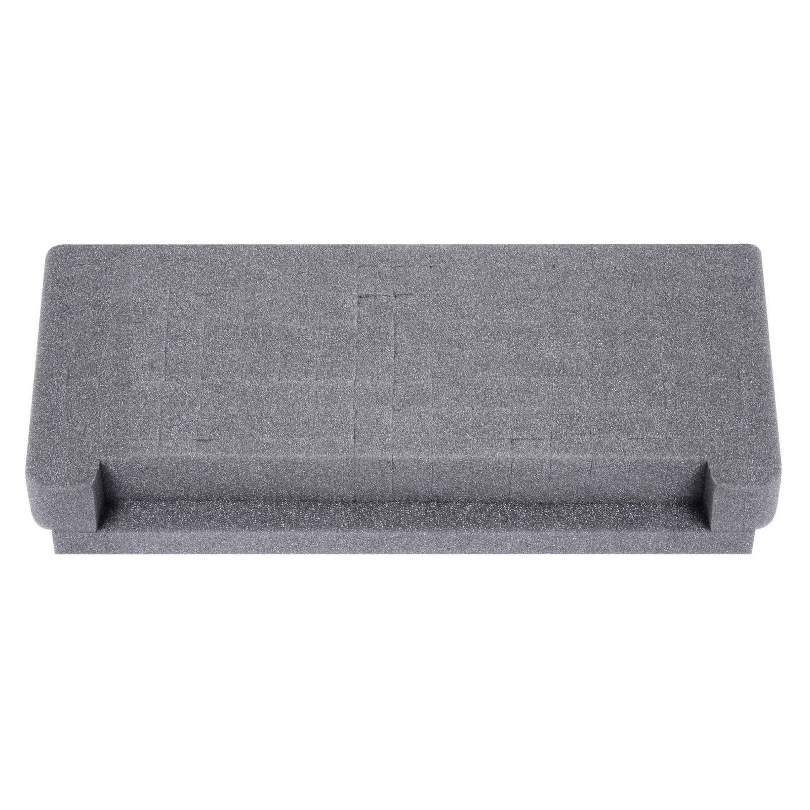 Graue Schaumstoffeinlage mit rechteckiger Aussparung, wahrscheinlich zur Verpackung oder zum Schutz von Gegenständen verwendet.