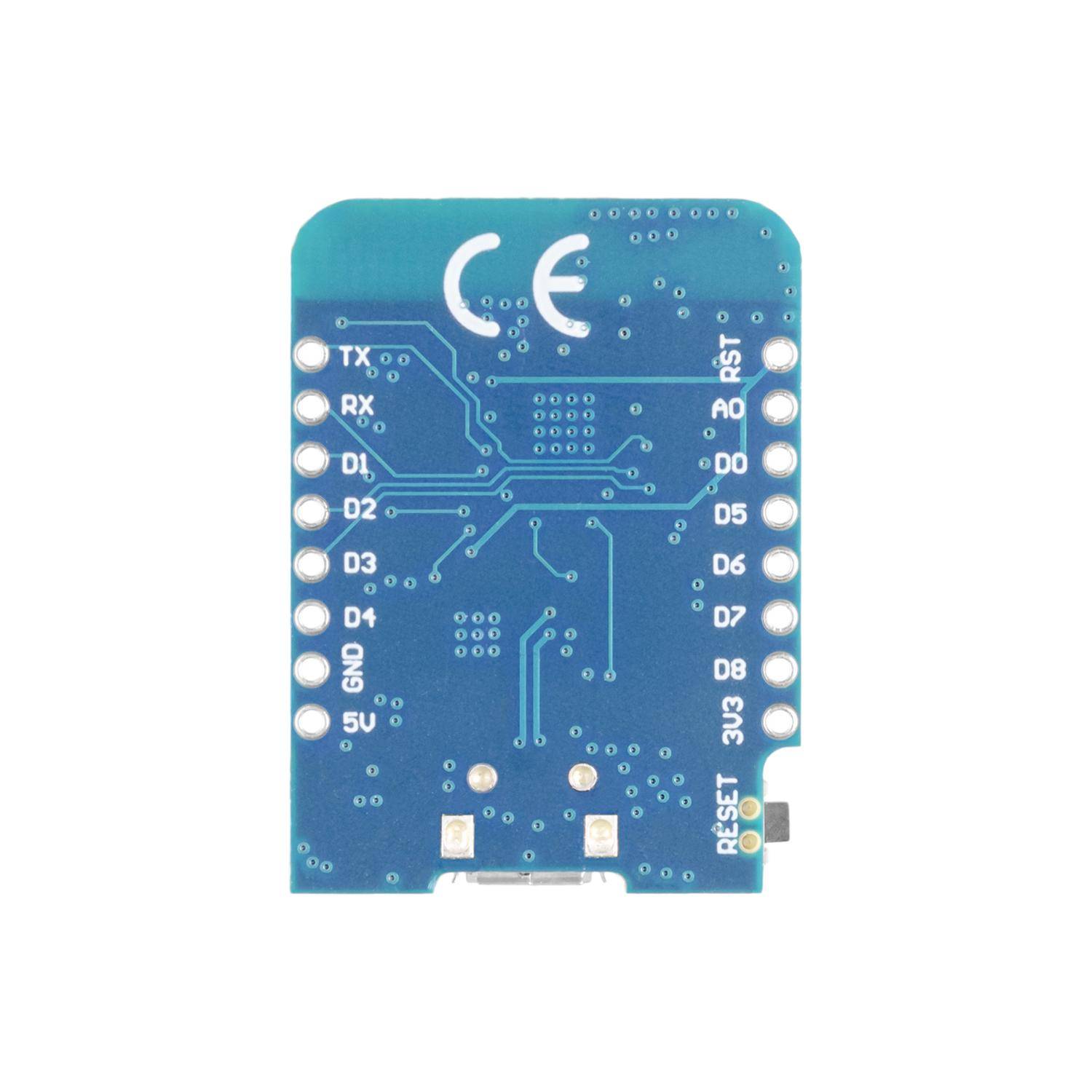 Eine blaue elektronische Leiterplatte mit verschiedenen beschrifteten Anschlüssen für Konnektivität, einschließlich 'TX', 'RX', 'GND', 'RST'. Ihre Oberfläche weist weißen Text und Linien zur Darstellung der Schaltkreise auf.