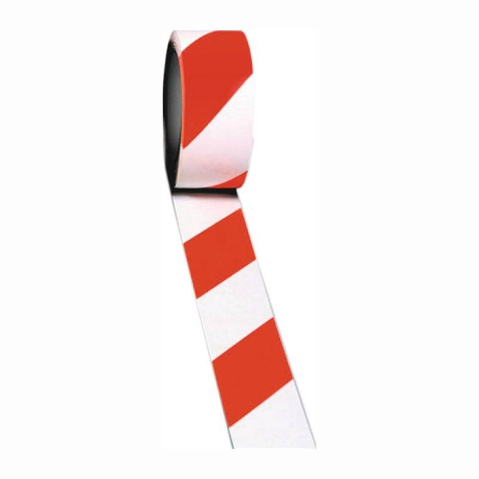 Eine Rolle rot-weiß gestreiftes Absperrband, leicht abgerollt, das häufig verwendet wird, um Bereiche zu sperren oder Gefahrenzonen zu markieren.