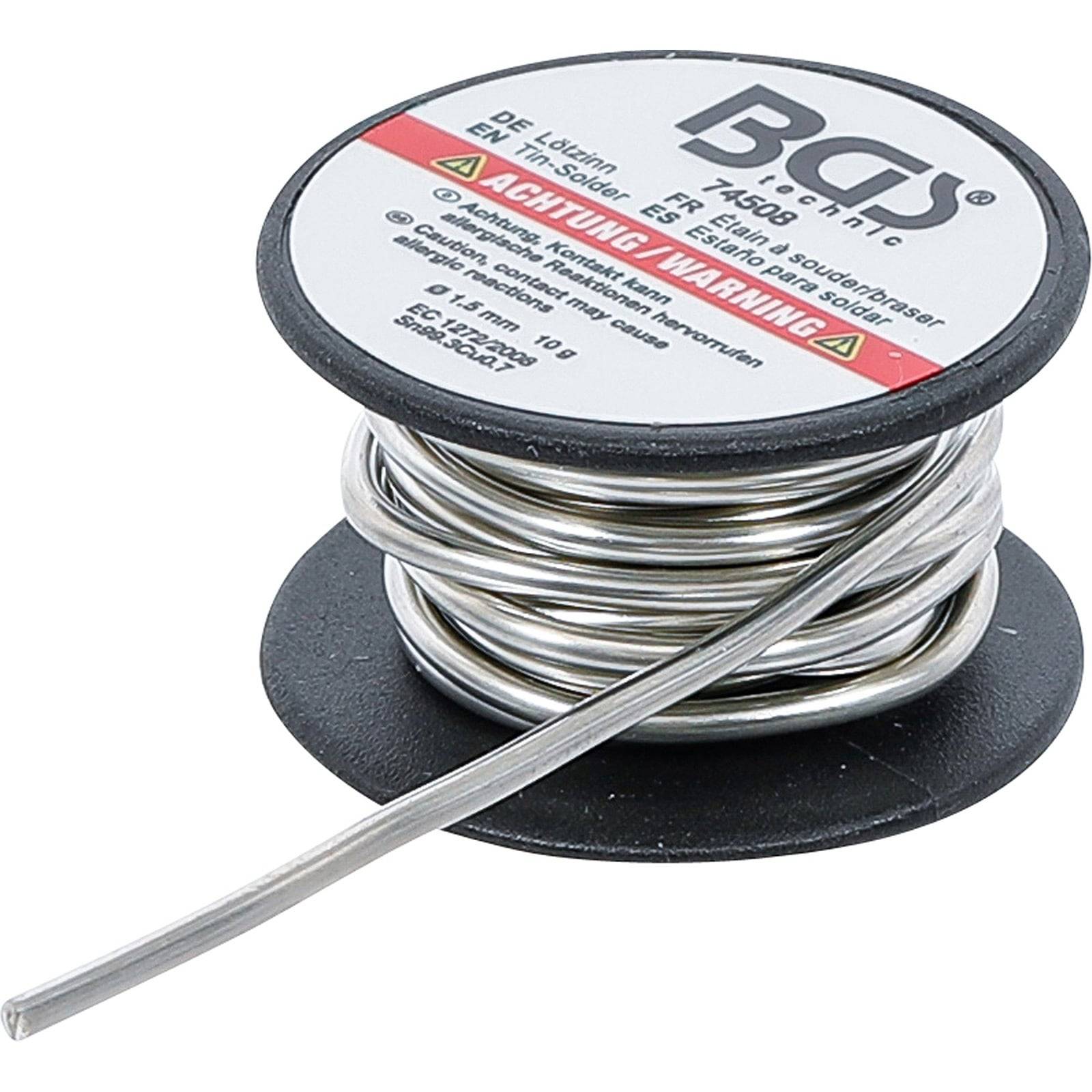 Eine Spule BGS-Lötzraht, die mit Sicherheitswarnungen und Spezifikationen in mehreren Sprachen beschriftet ist. Silberner Draht ist um eine schwarze Spule gewickelt.