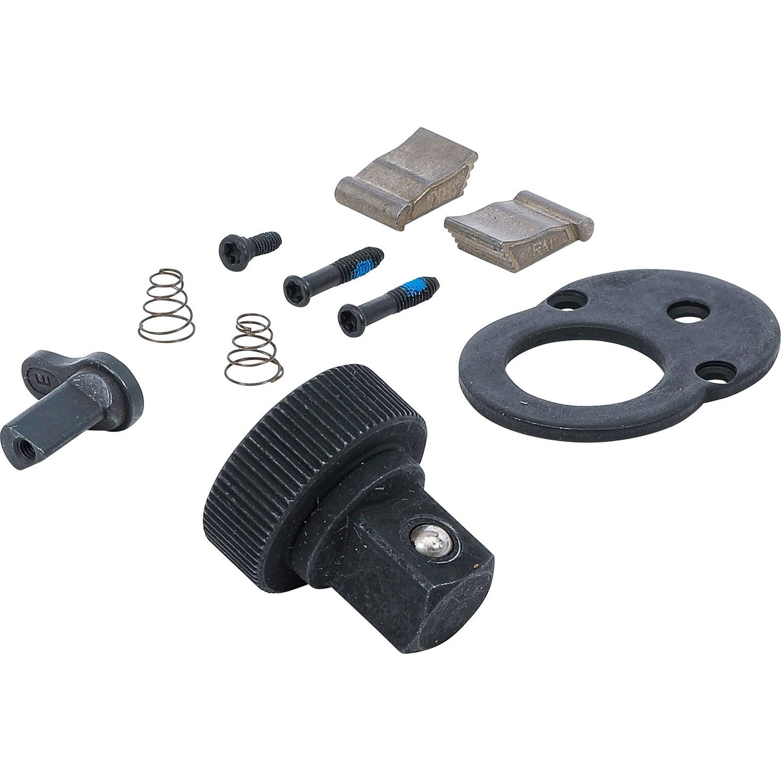 Ein Zahnrad-Reparaturset mit verschiedenen Komponenten, darunter ein rundes Knopf, Federn, Schrauben und Metallteile, auf einer weißen Oberfläche angeordnet.