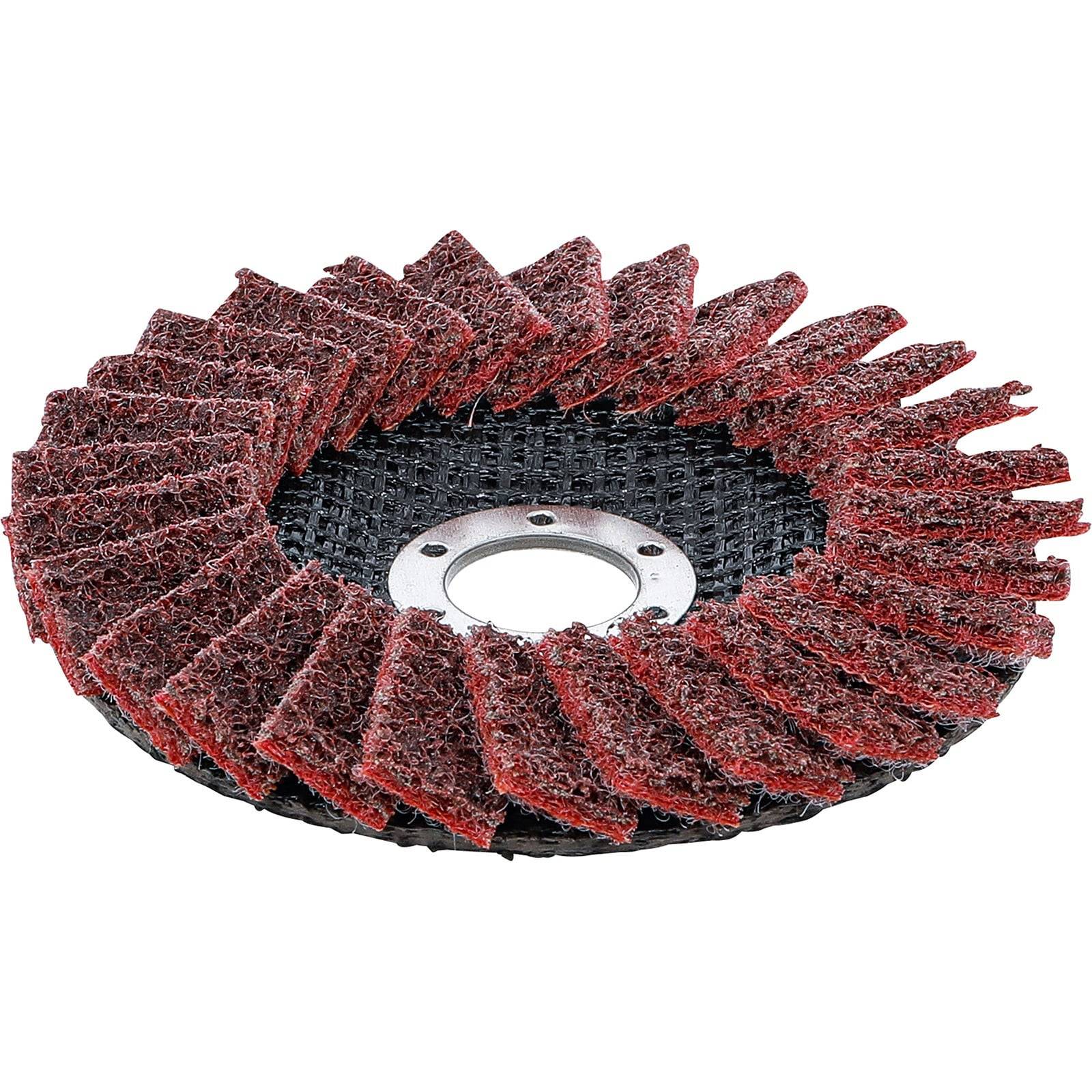 Eine rote und schwarze Schleifscheibe, die zum Schleifen und Bearbeiten von Oberflächen verwendet wird und geschichtete Abschnitte rund um einen zentralen Metallkern aufweist.