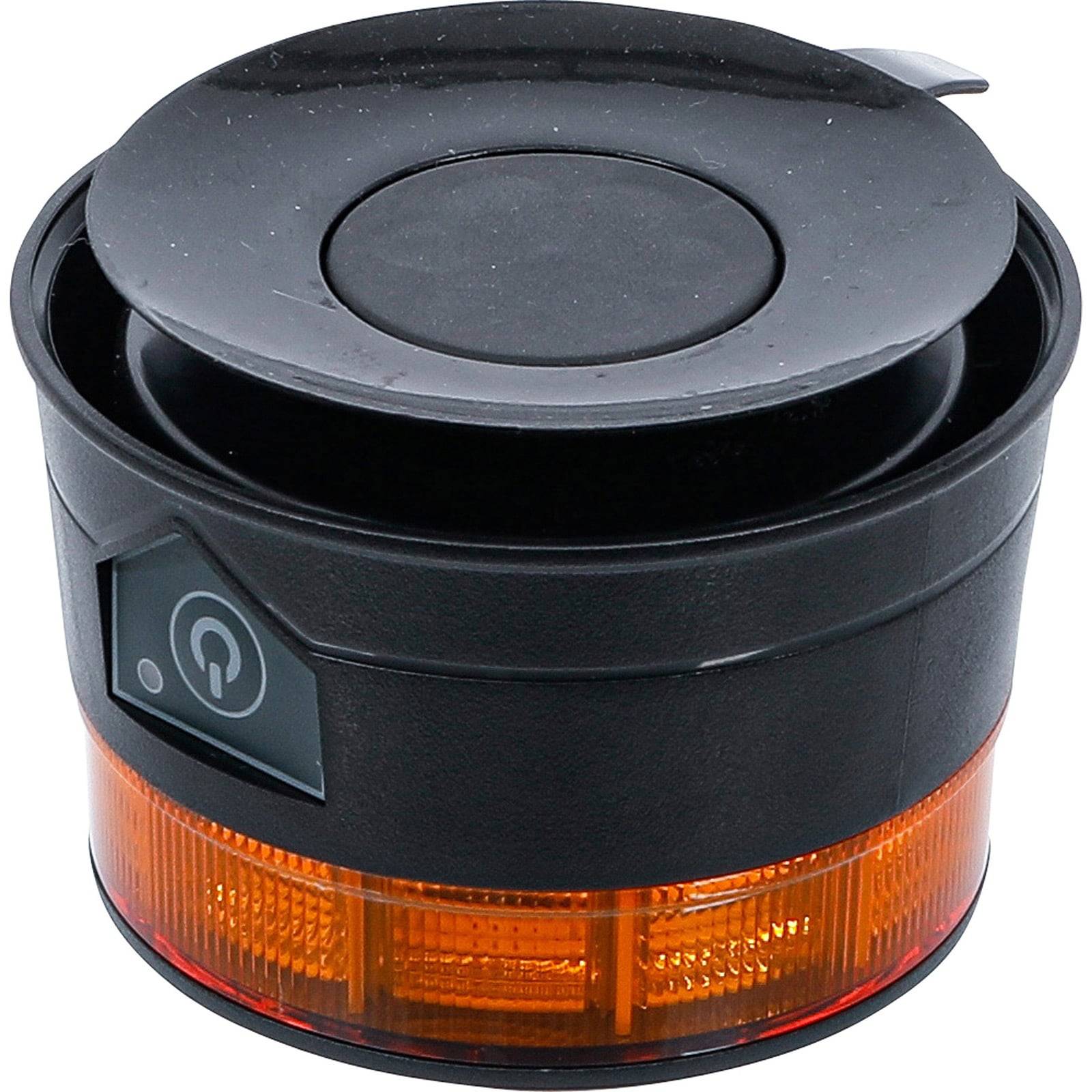 Ein rundes schwarzes Gerät mit einem orangefarbenen Lichtband und einem Netzschalter-Symbol, möglicherweise eine mobile Verkehrsampel oder Warnleuchte.