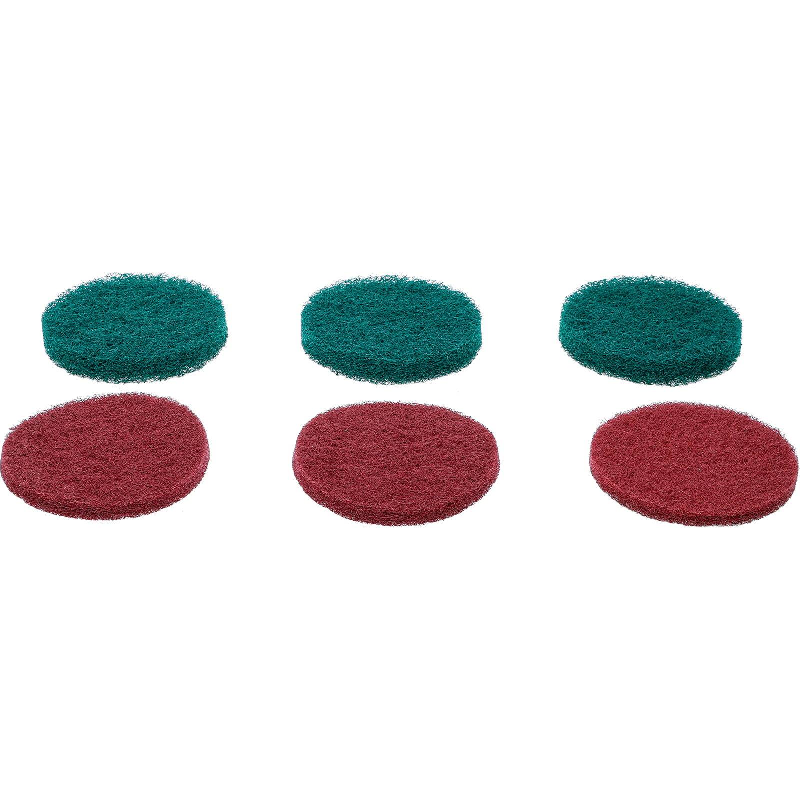 Drei grüne und drei rote kreisförmige Schleifpads, in zwei Reihen angeordnet, die für Reinigungs- oder Oberflächenvorbereitungsaufgaben verwendet werden.