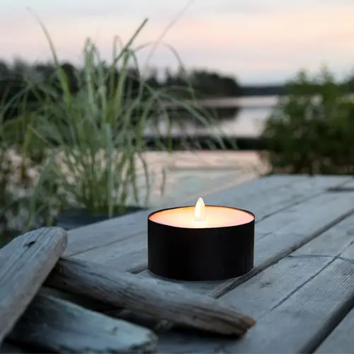 XXL LED Teelicht gelbe LED H: 7cm D: 10cm Batteriebetrieb Timer Outdoor schwarz XXL LED Teelicht gelbe LED H: 7cm D: 10cm Batteriebetrieb Timer Outdoor schwarz