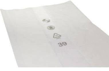 Eine weiße Oberfläche mit Symbolen, einschließlich eines Recycling-Logos und eines Dreiecks mit „LDPE