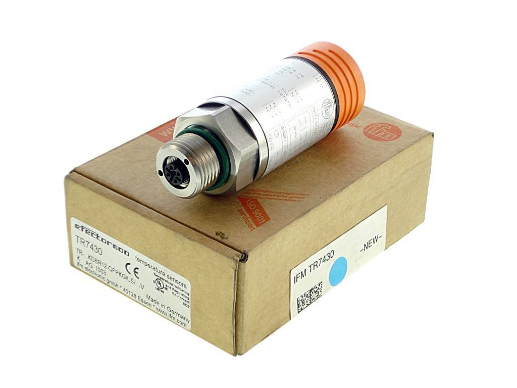 Industrie-Drucksensor auf einem Karton, auf weißem Hintergrund dargestellt.
