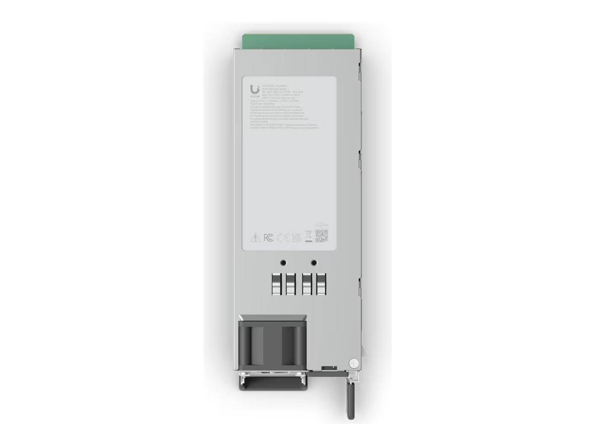 Frontansicht eines grauen elektronischen Moduls mit Etikett, Lüftungsöffnungen, Steckeröffnungen und einer grünen oberen Lasche auf weißem Hintergrund.