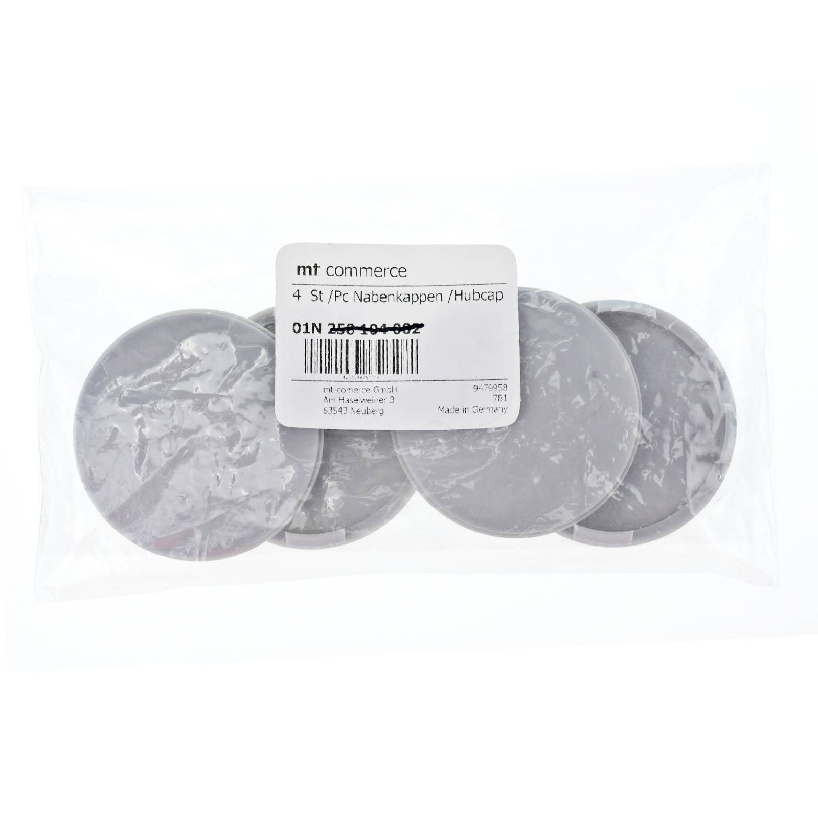 4 St/Stk Nabenkappen/Radkappen in einer transparenten Plastiktüte, die vier silberne Radkappen enthält. Markenetikett von 'mt commerce' sichtbar.