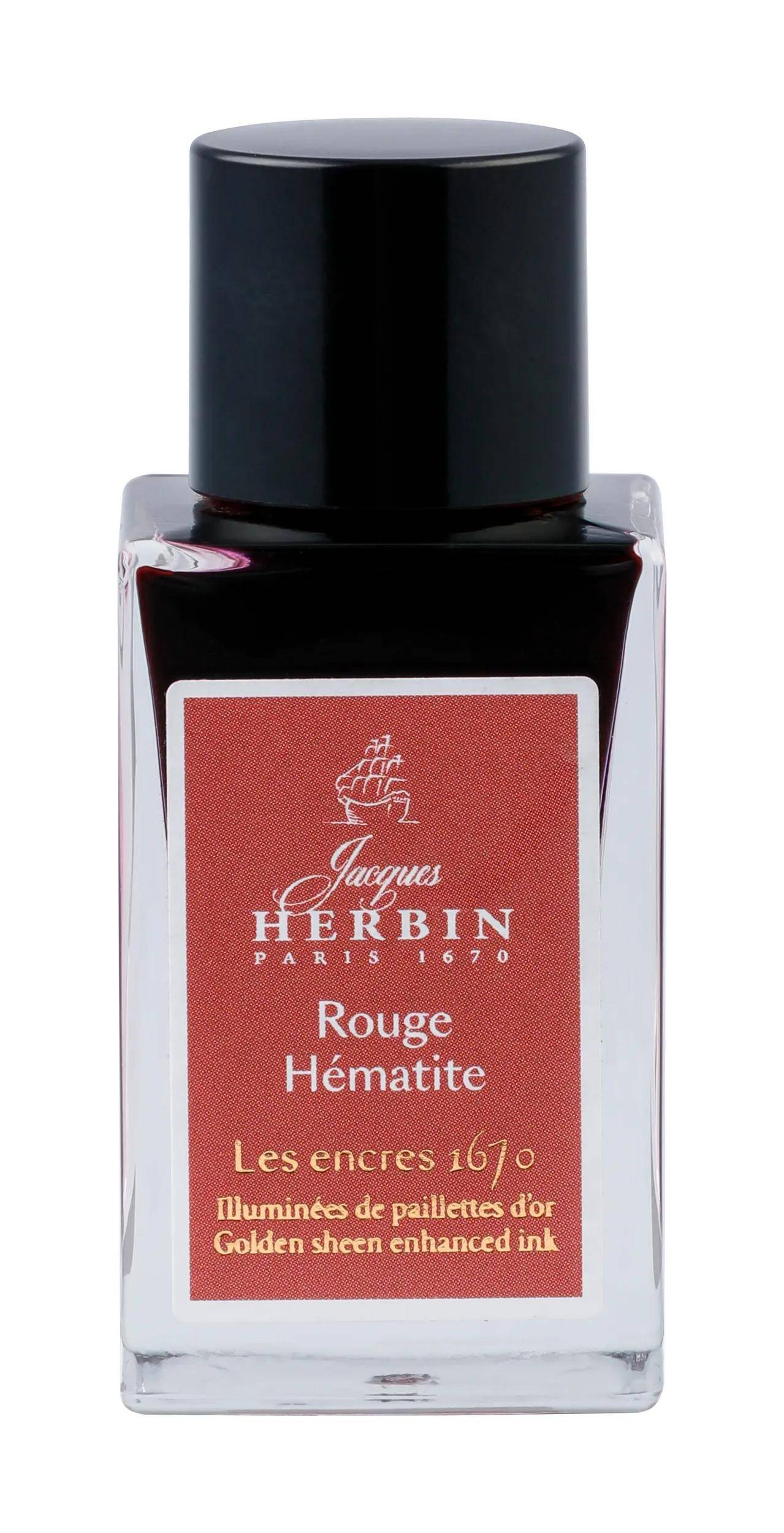 Eine Flasche Jacques Herbin Ink in Rouge Hématite mit schwarzem Verschluss und rotem Etikett, gekennzeichnet mit „Les encres 1670