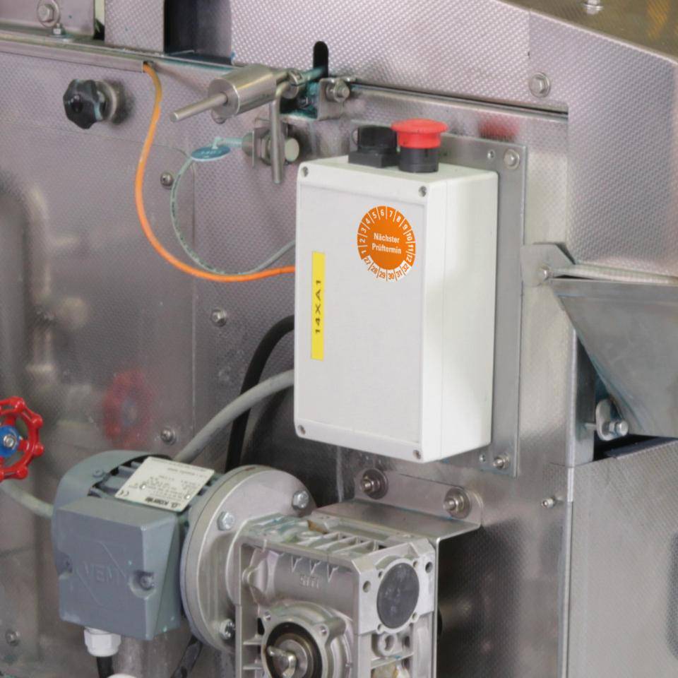 Prüfplakette Nächster Prüftermin 27-32, orange, Schachbrettfolie, Ø 30mm, 18/Bogen