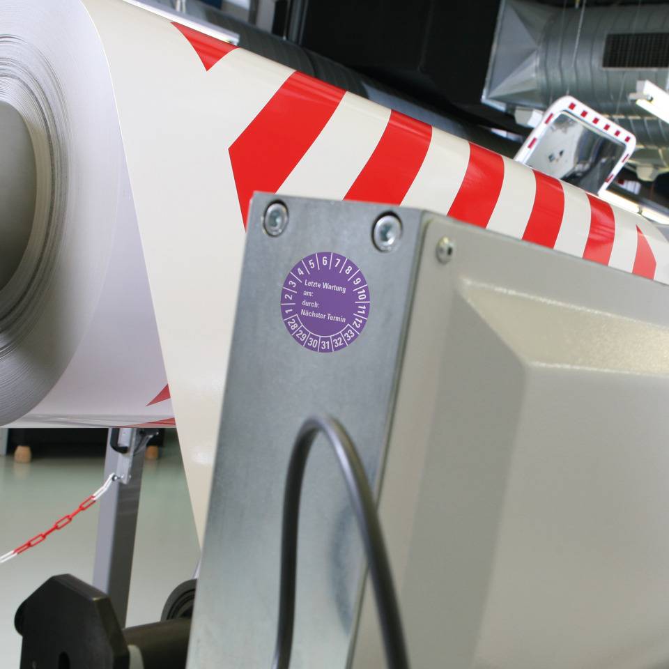 Prüfplakette Letzte Wart., am, durch, Nächste Prüfung 28-33, violett, Dokumentenfolie, Ø30mm, 18/BOG