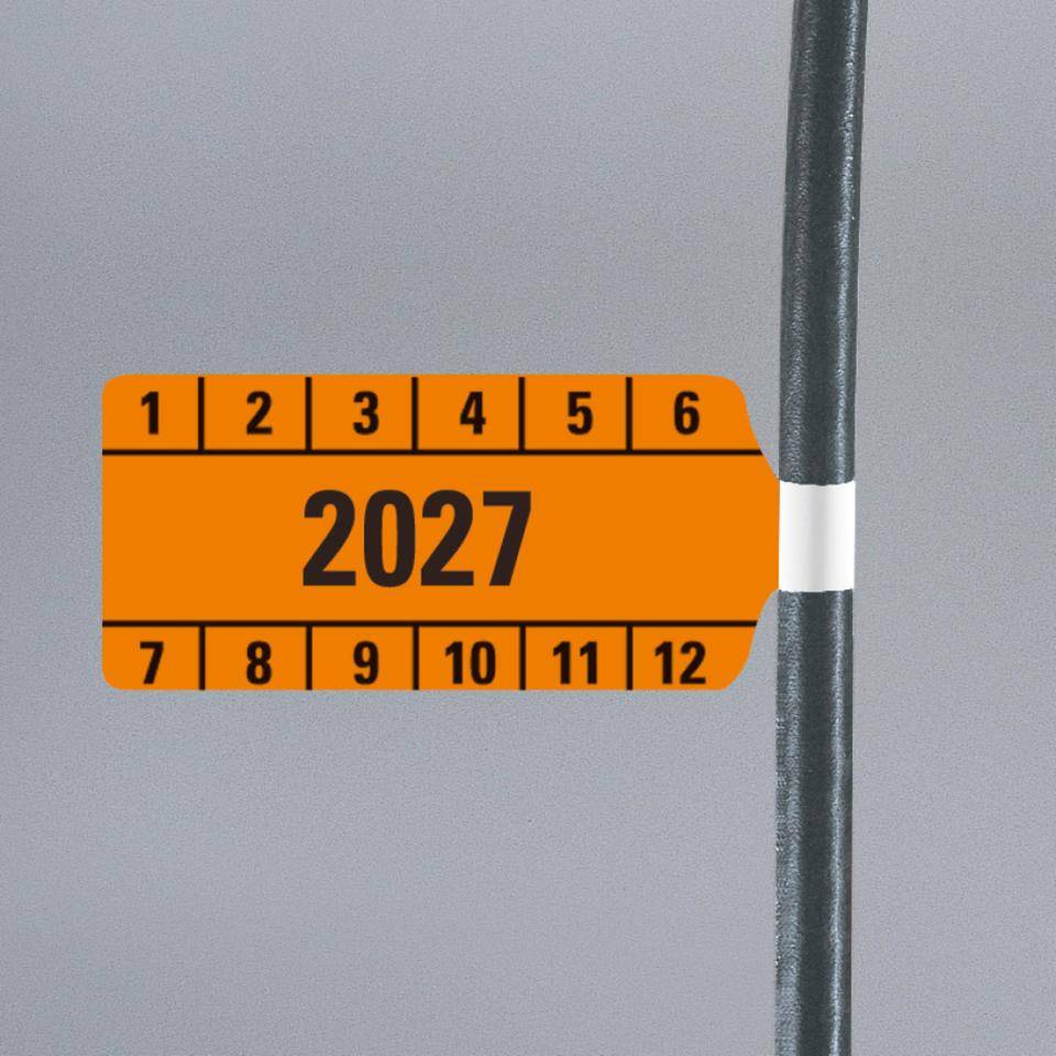 Kabelprüfplakette 2027, orange, Folie, selbstklebend, 65x30mm, 10/Bogen
