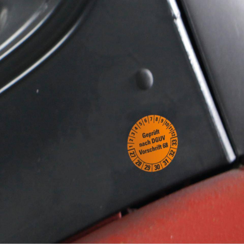 Prüfplakette Geprüft nach DGUV Vorschr.68, 27-33, orange, Folie,Oberflächensch., Ø 40mm, 10/BOG